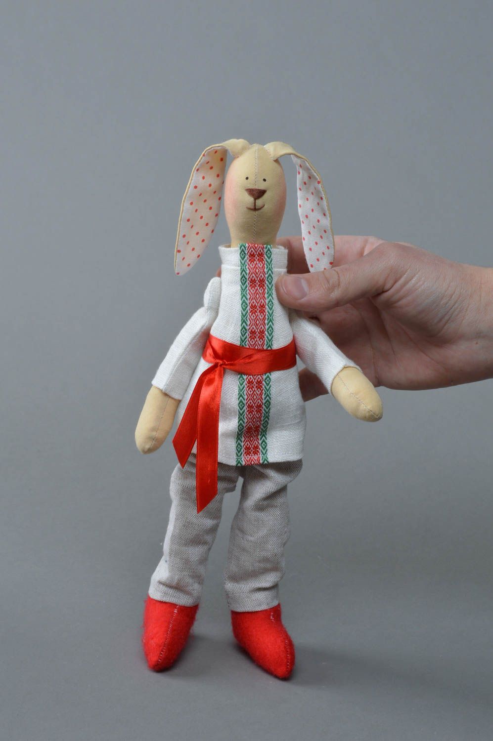 Handmade linen and cotton fabric soft toy rabbit in ethnic costume and red shoes photo 4