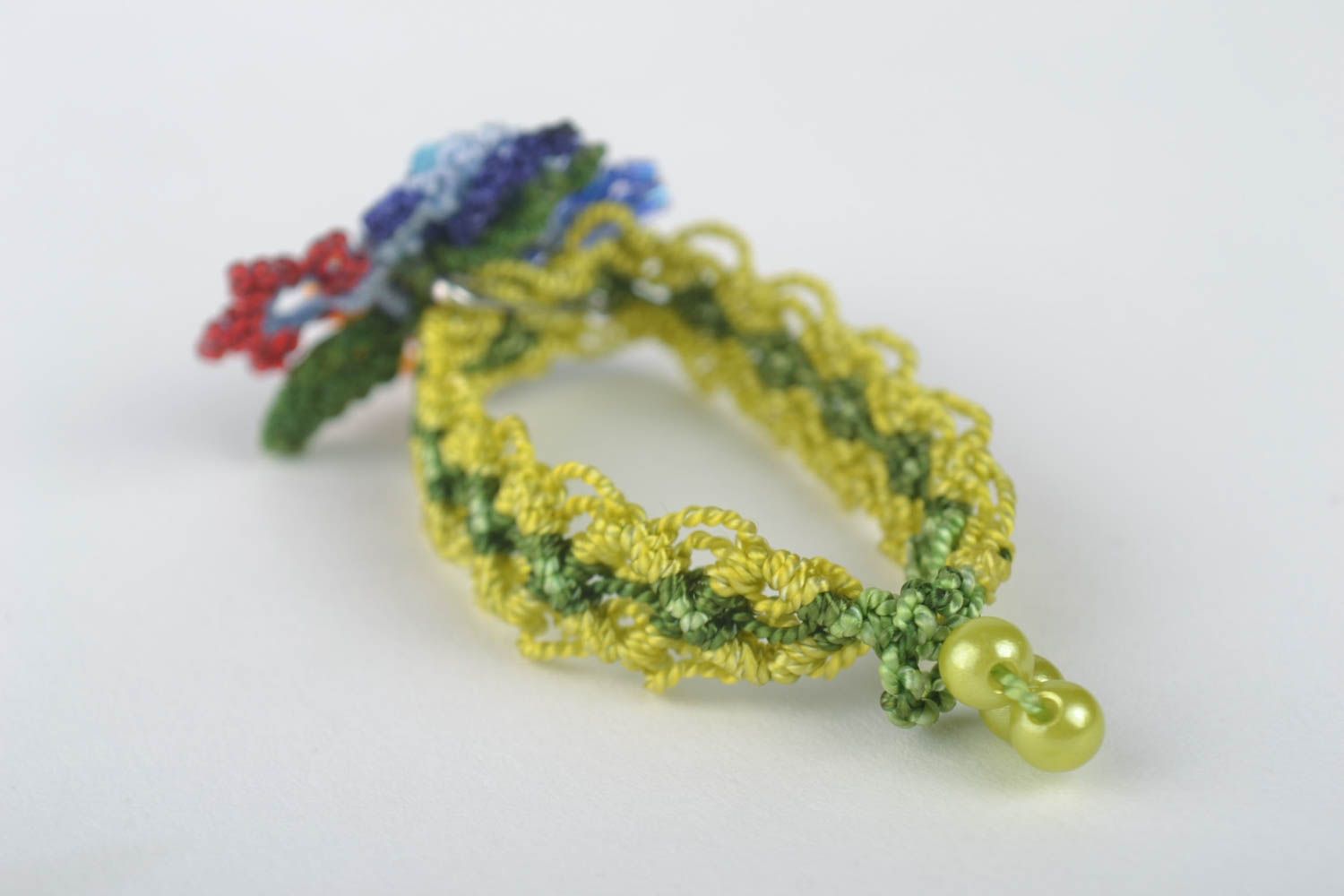 Украшения ручной работы браслет на руку плетеная брошь с цветами красивая фото 3
