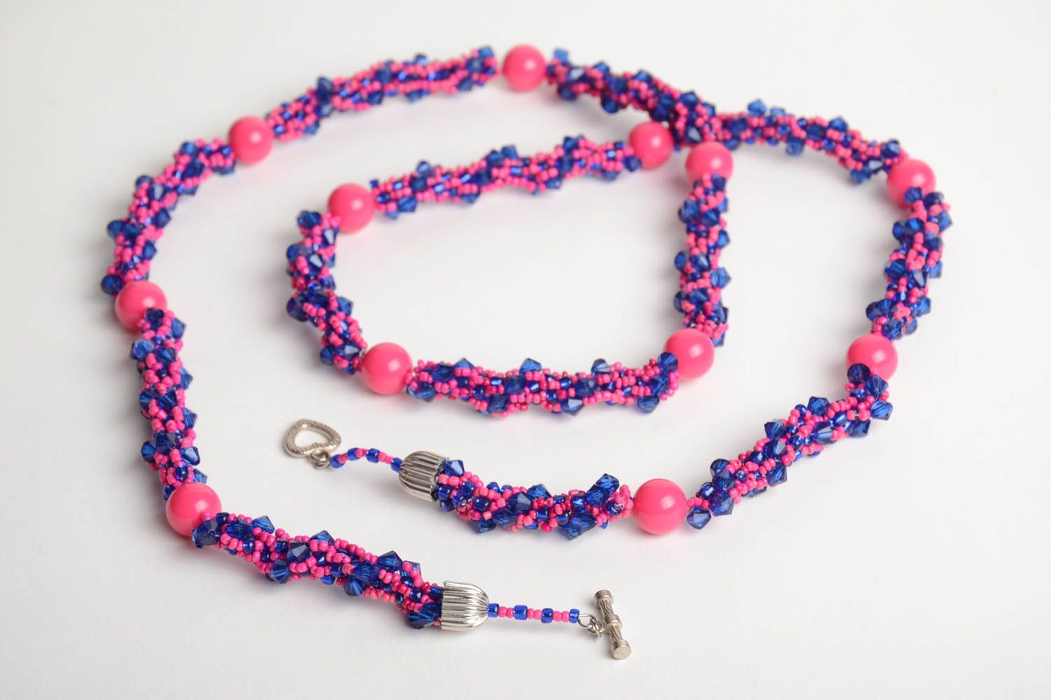 Handmade designer women's necklace crocheted of bright pink and blue Czech beads photo 3