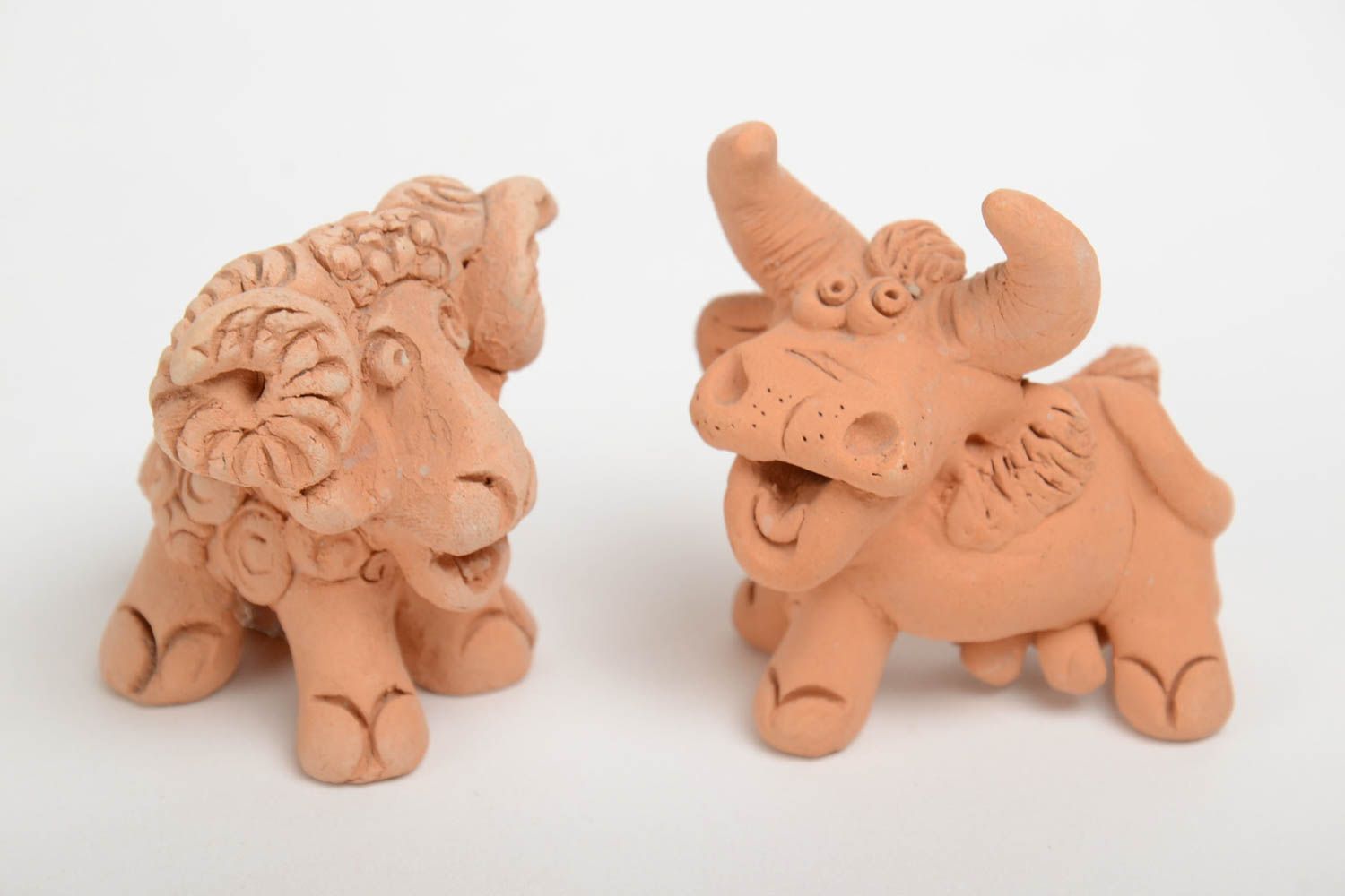 Set of two handmade clay cow and lamb figurines for decoration photo 2
