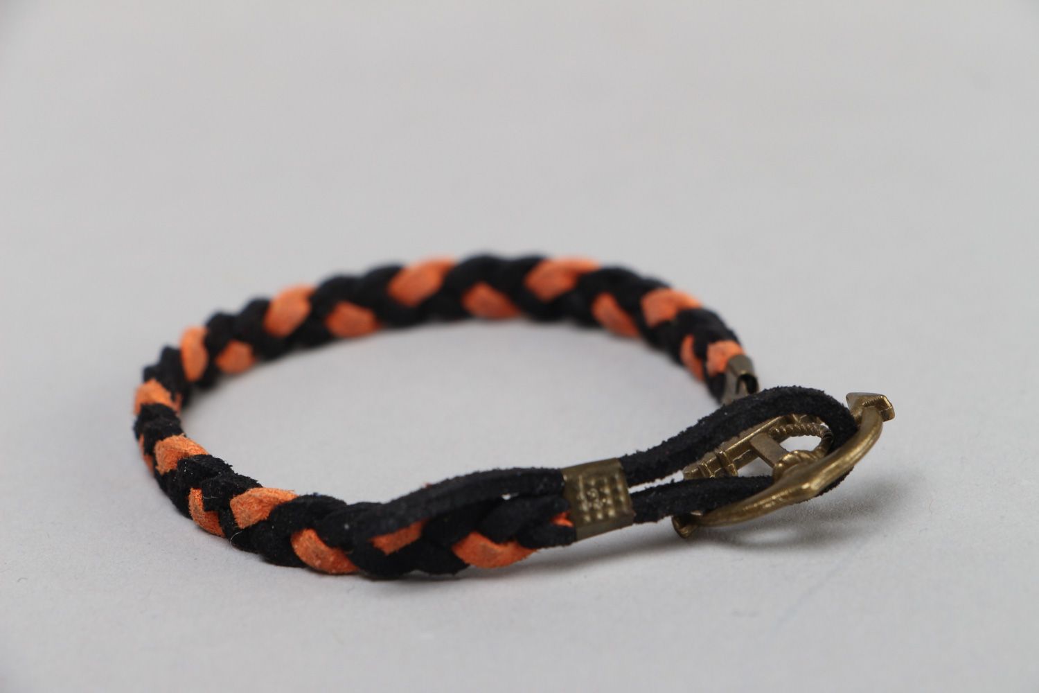 Handmade thin friendship bracelet woven of faux suede with anchor shaped charm photo 2