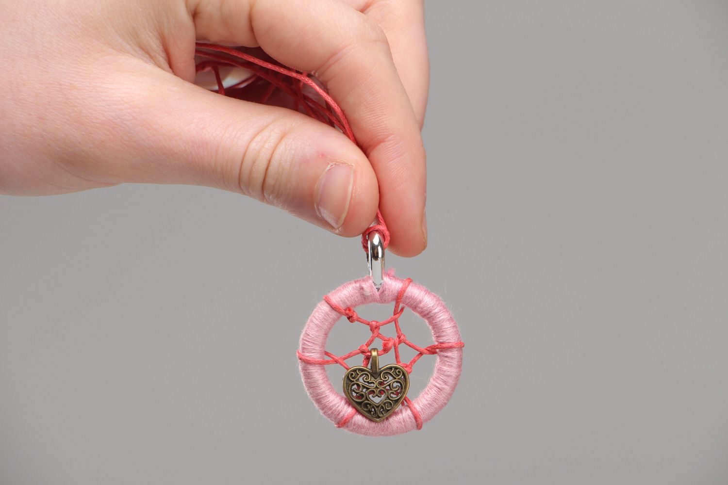 Small pink dreamcatcher pendant necklace with a charm on cord for women photo 4