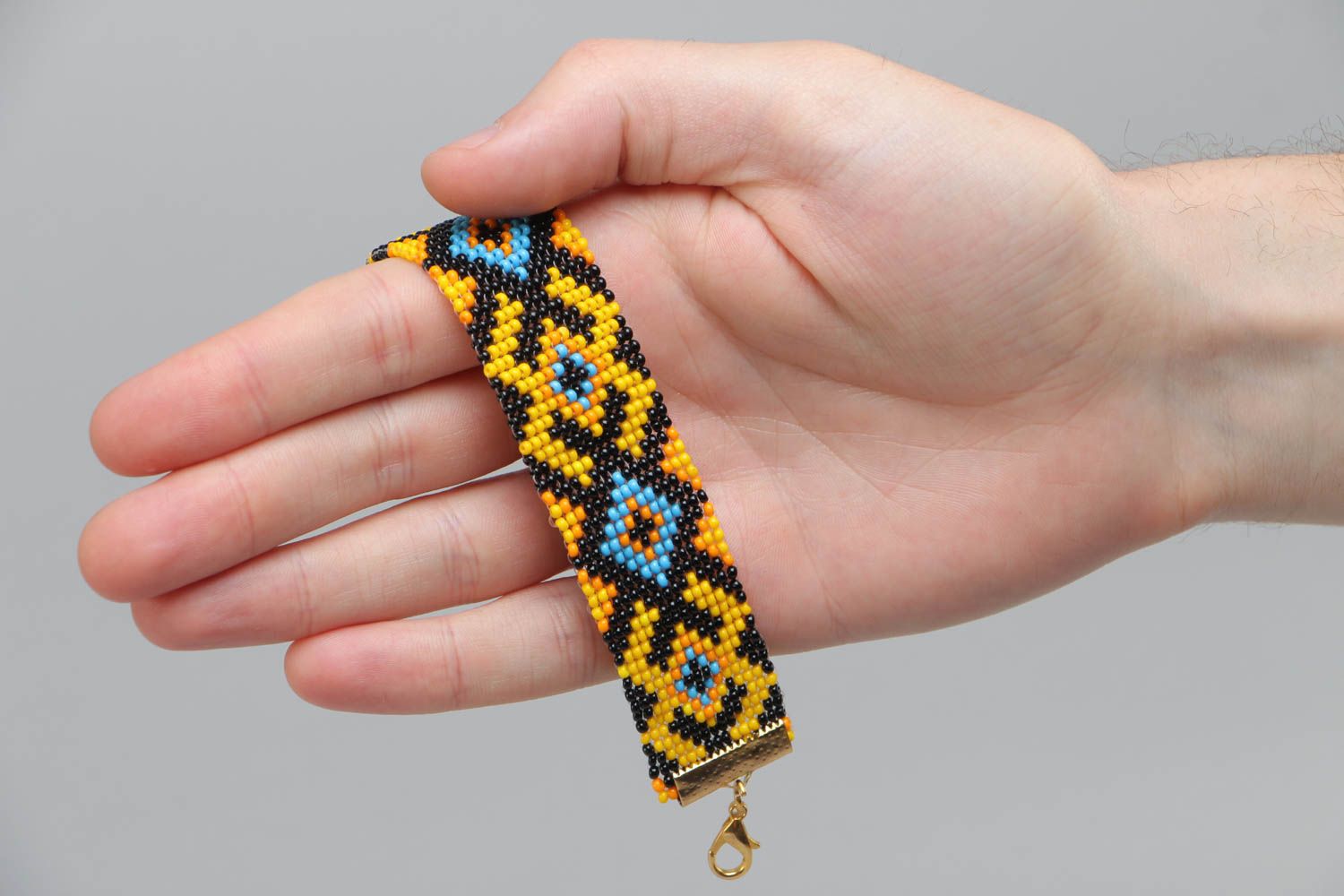 Handgemachtes buntes Armband mit Ornament aus Glasperlen im ethnischen Stil foto 5