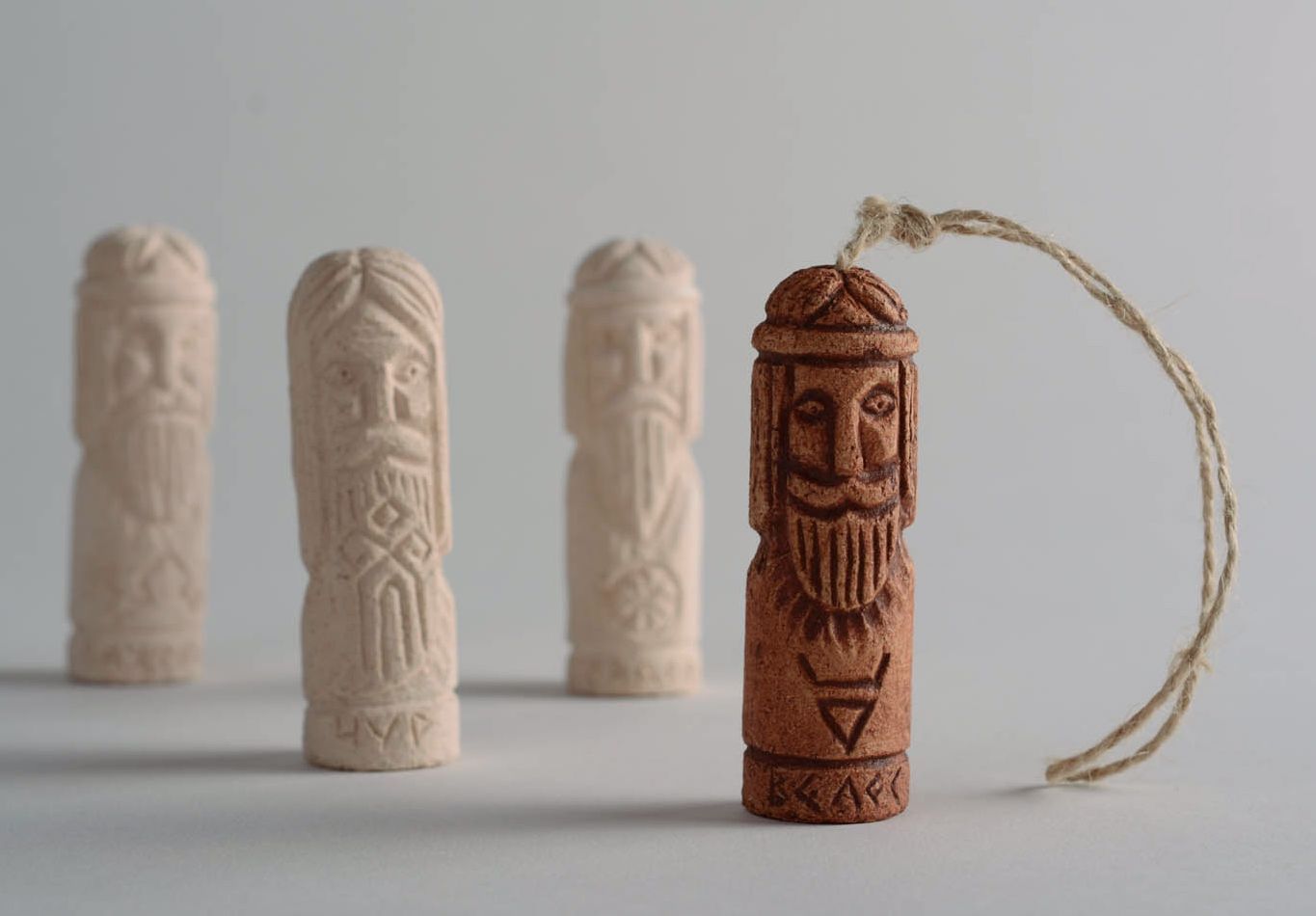 Ceramic amulet pendant Veles photo 1