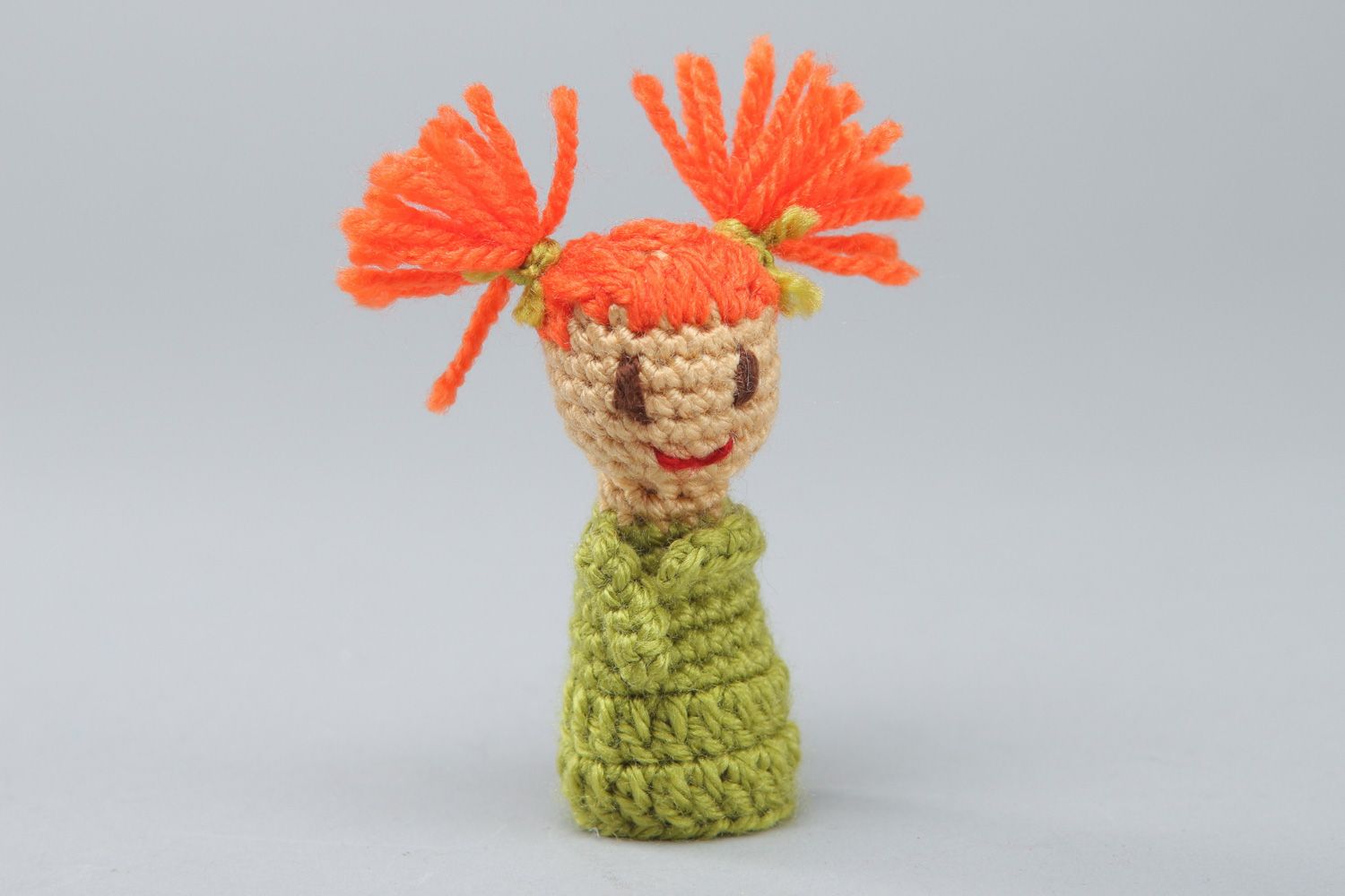 Handmade finger puppet crocheted of acrylic threads little girl for home theater photo 1