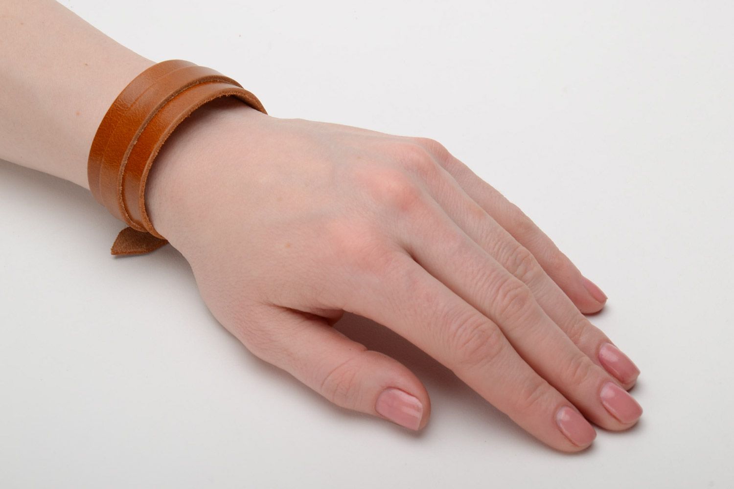 Handmade genuine leather wrist bracelet of brown color with buckle unisex photo 2