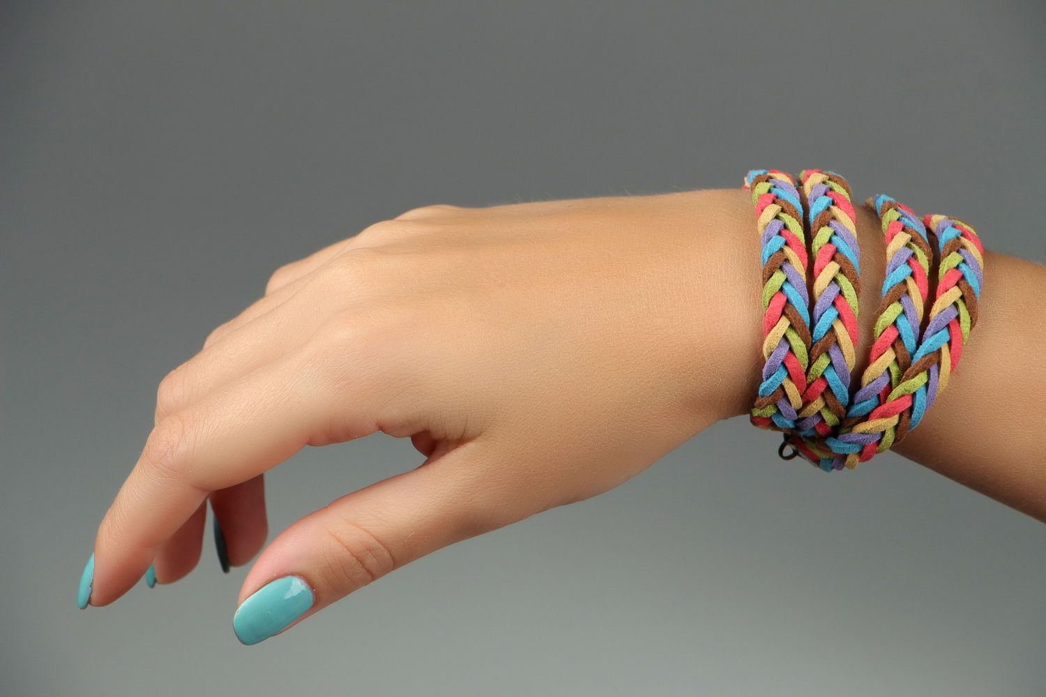 Bright braided bracelet made of suede photo 4