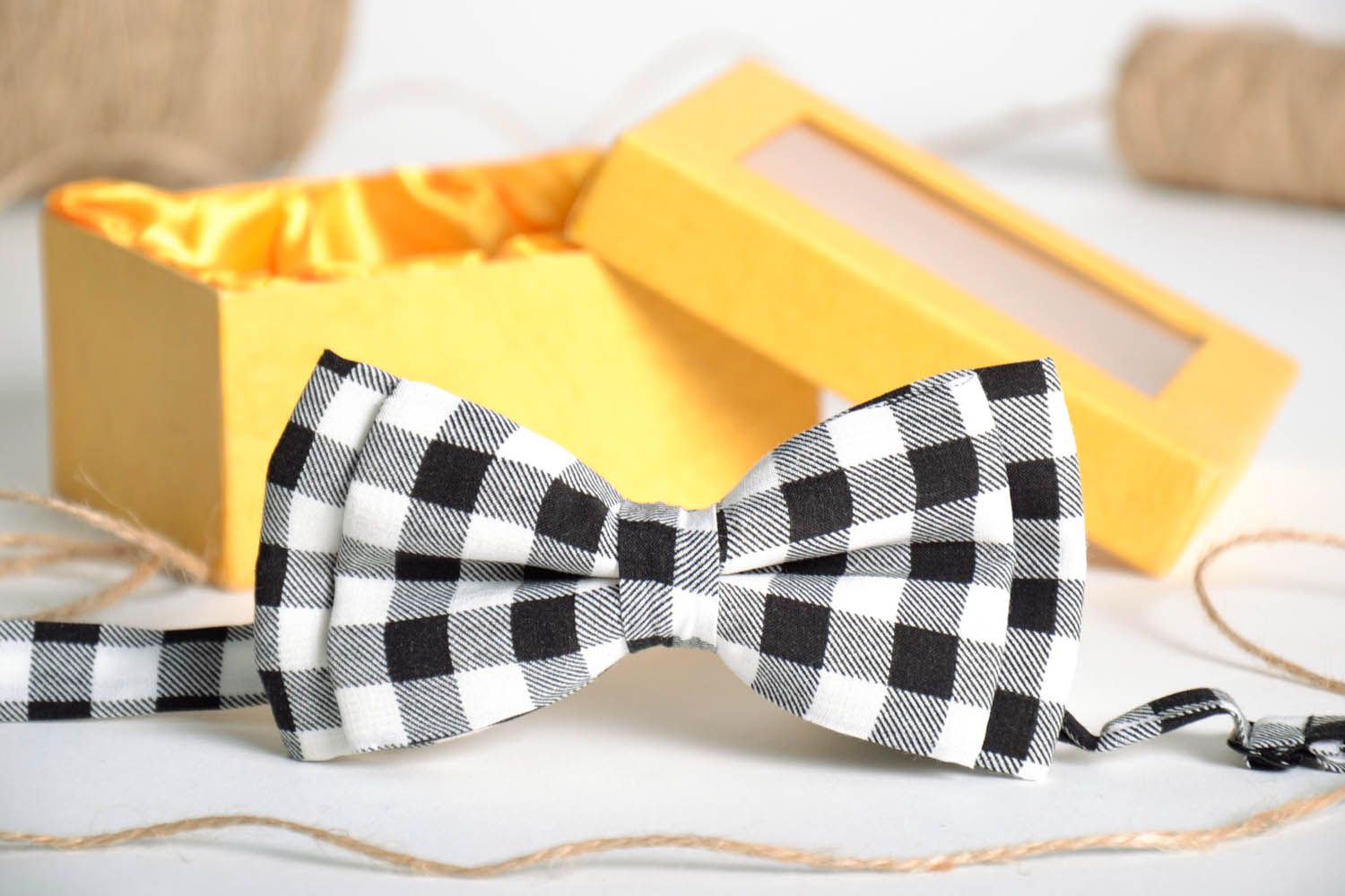 Black and white checked bow tie photo 1