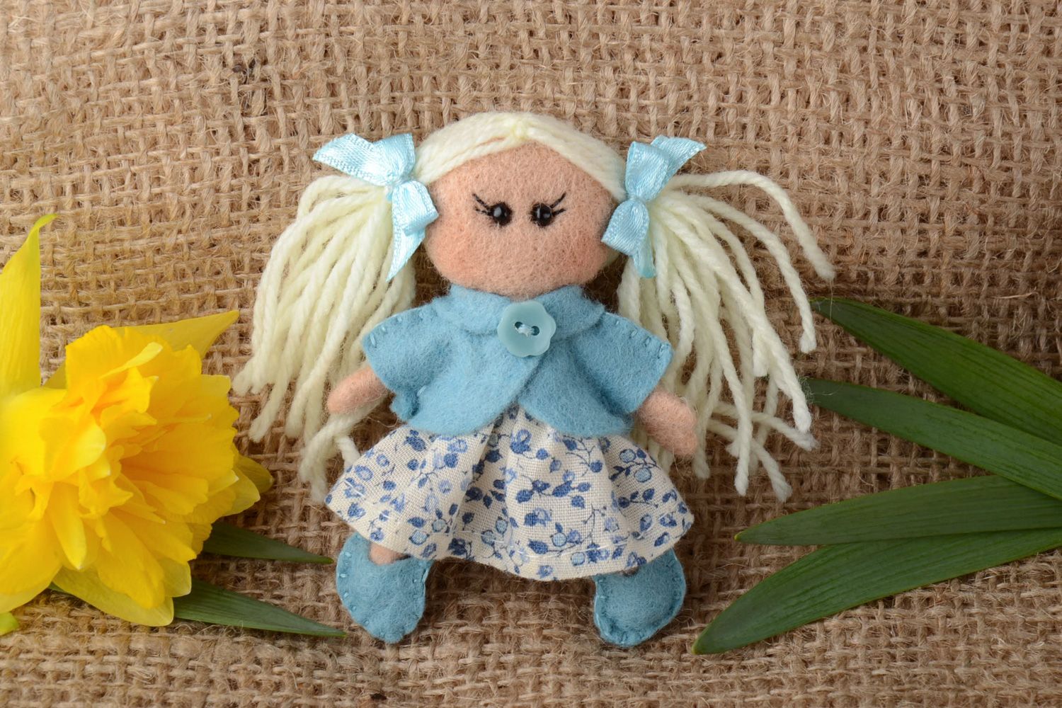 Handmade children's brooch felted of natural wool in the shape of little doll  photo 1