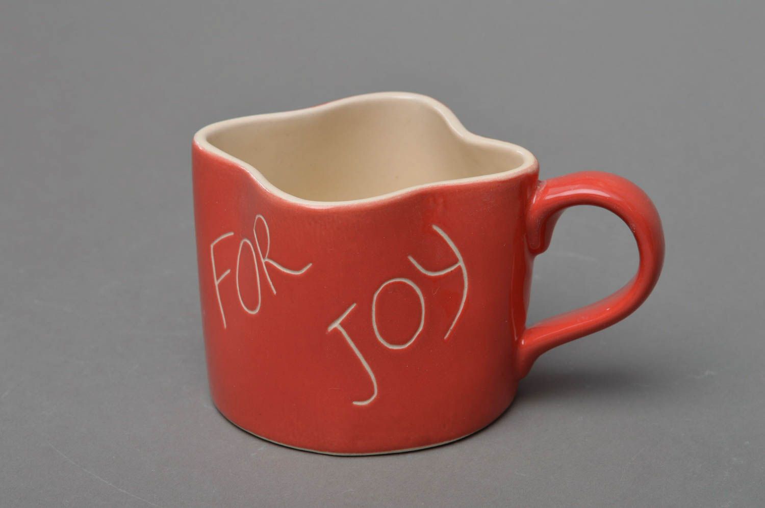 Square shaped ceramic glazed coffee cup in red and beige color photo 1