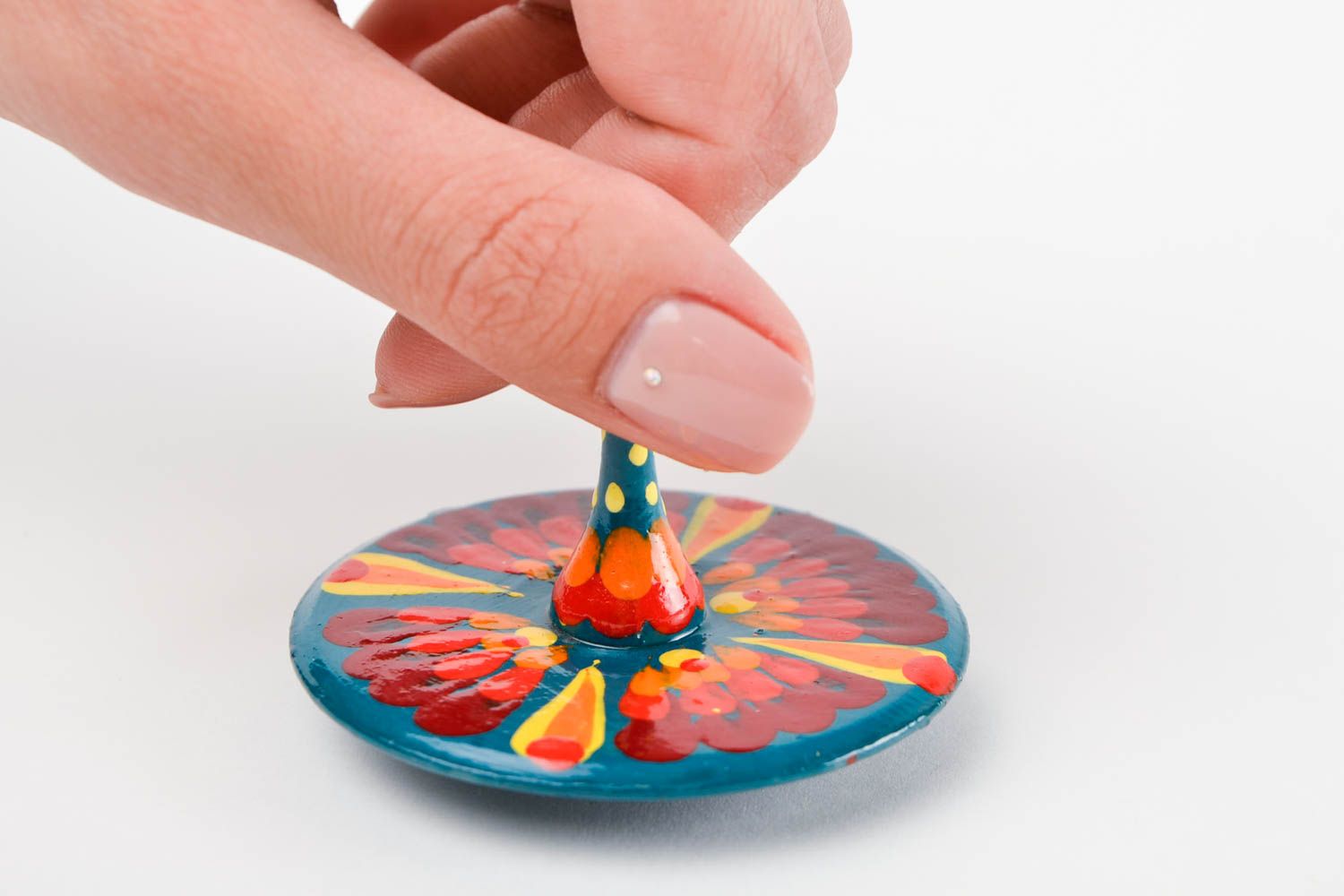 Игрушка из дерева игрушка ручной работы детская юла расписанная красками фото 2