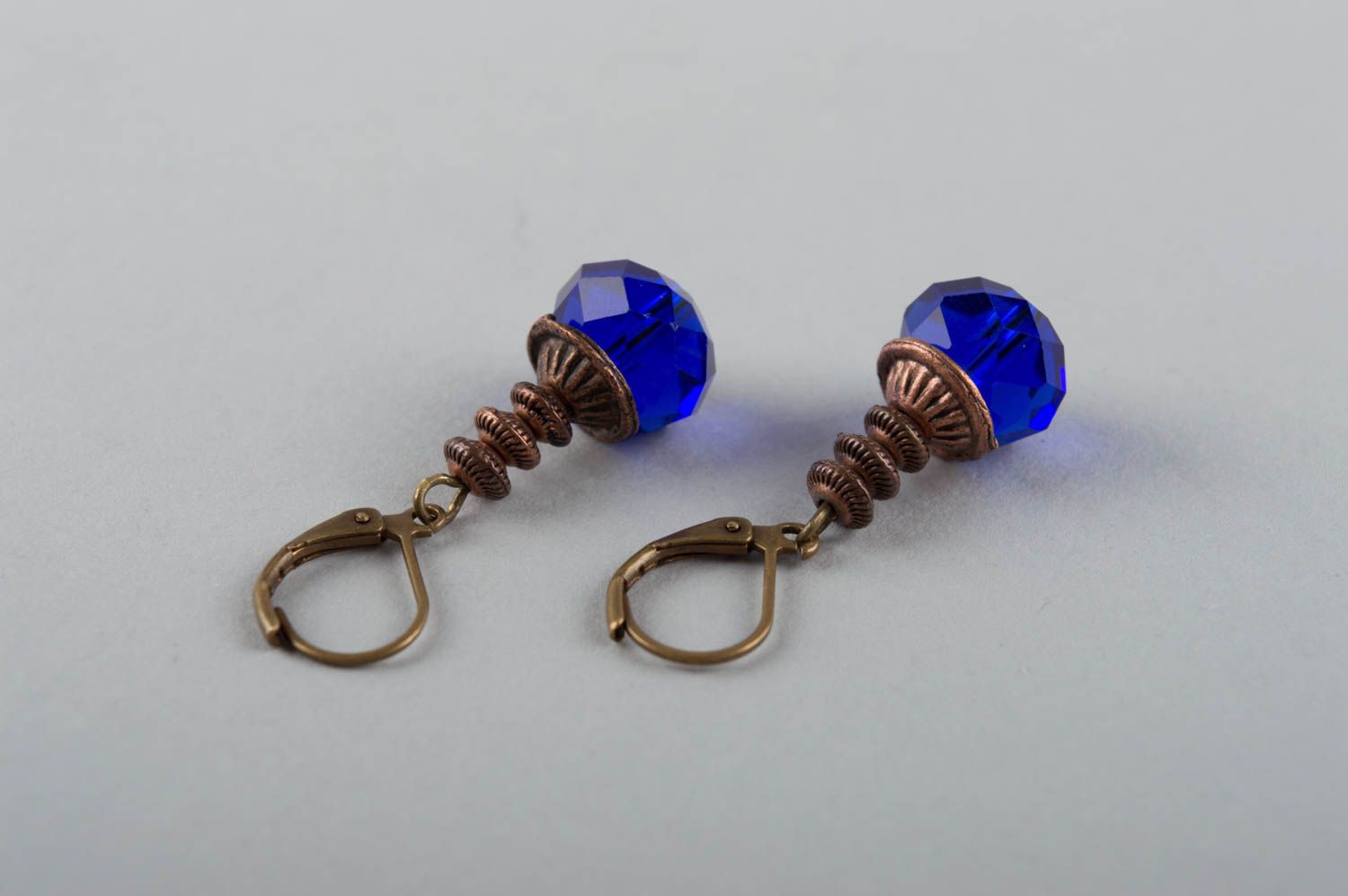 Unusual beautiful elegant handmade brass earrings with crystals of blue color photo 4