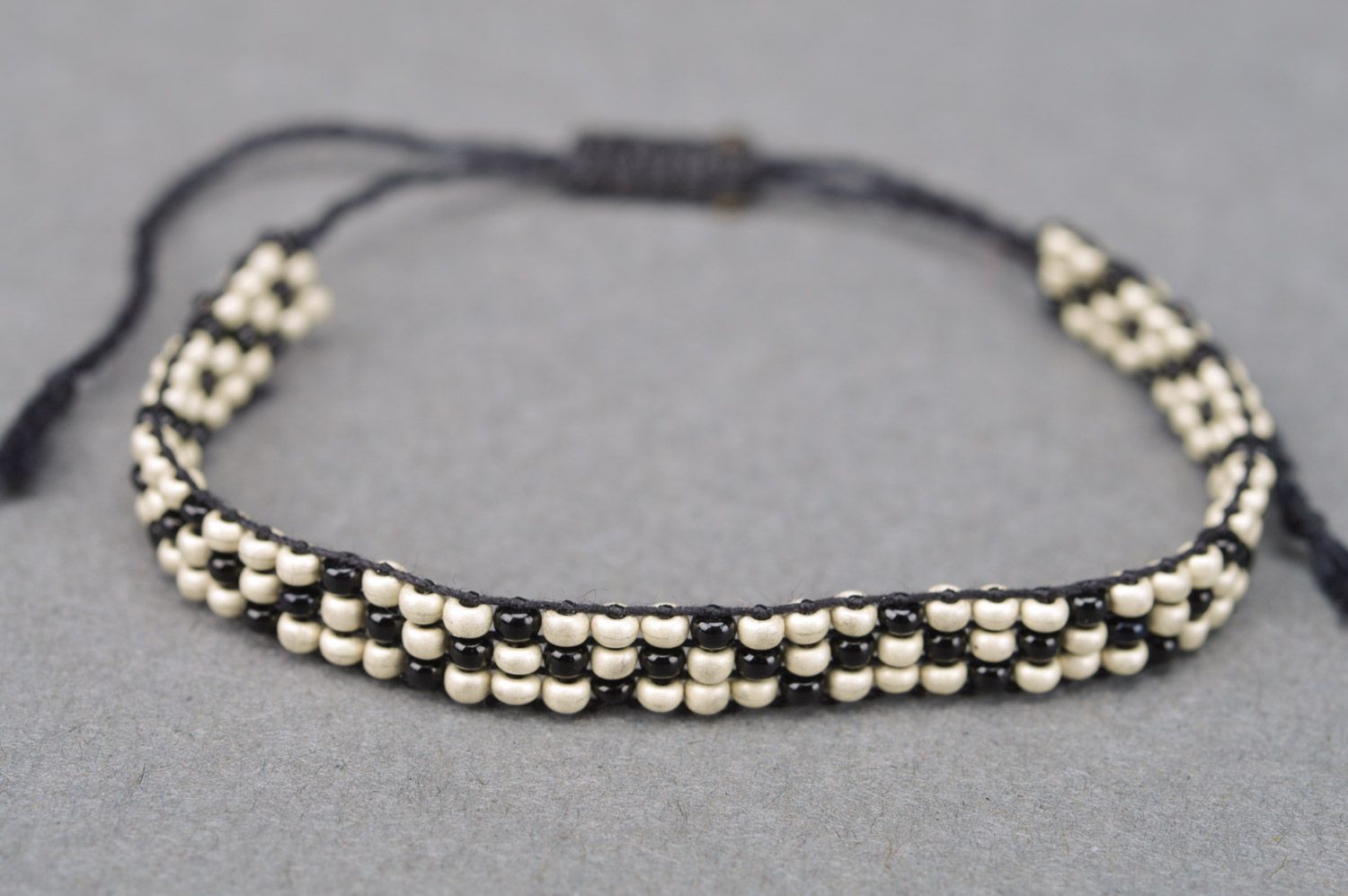Handmade plain thin beaded bracelet on ties with black and white pattern photo 2