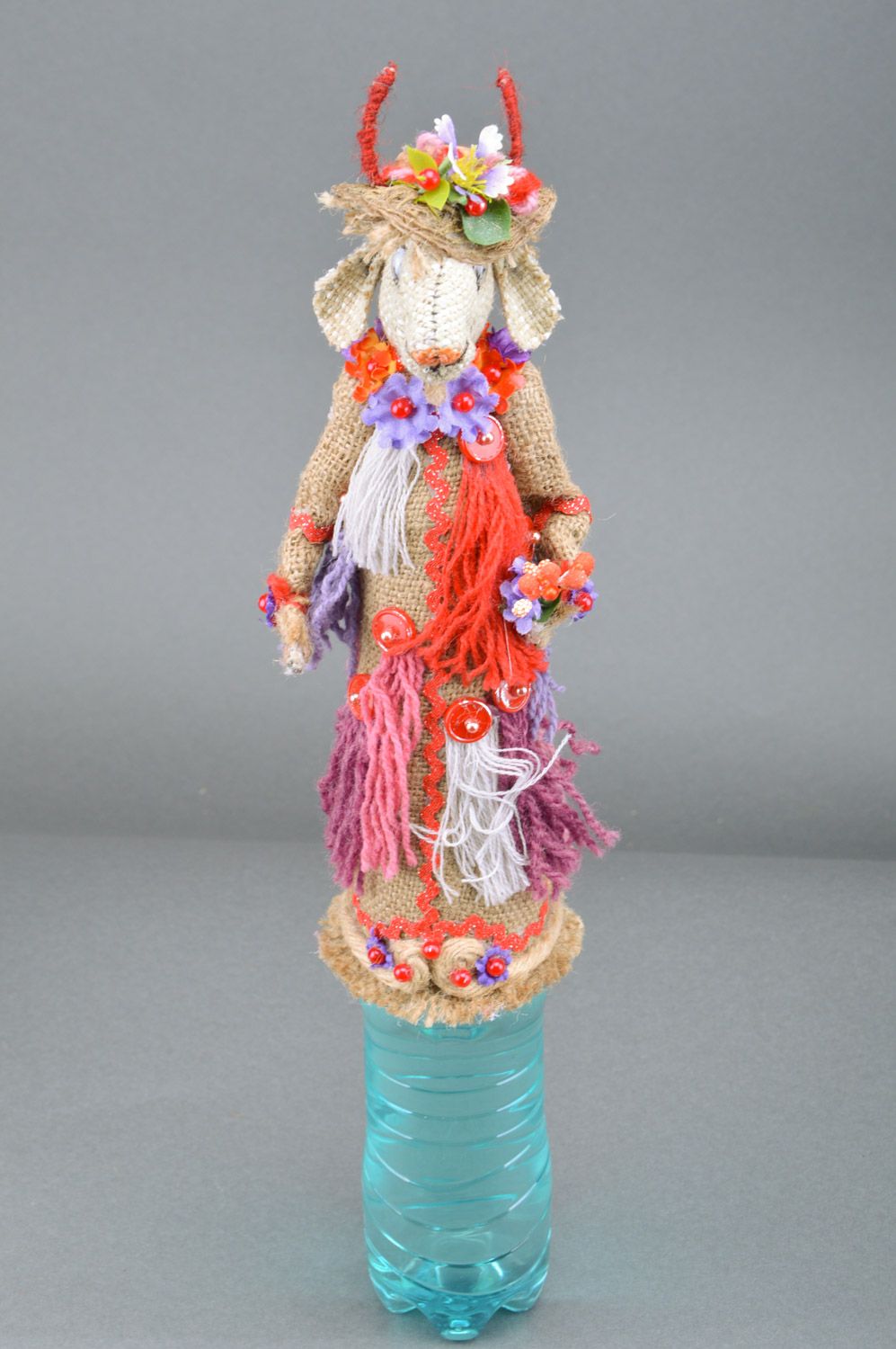 Handmade decorative bottle cozy sewn of burlap Goat in bright ethnic clothes photo 5