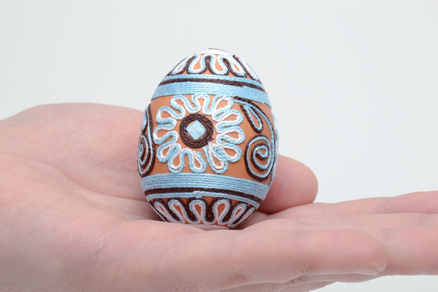 Handmade Easter egg decorated with silk threads photo 5