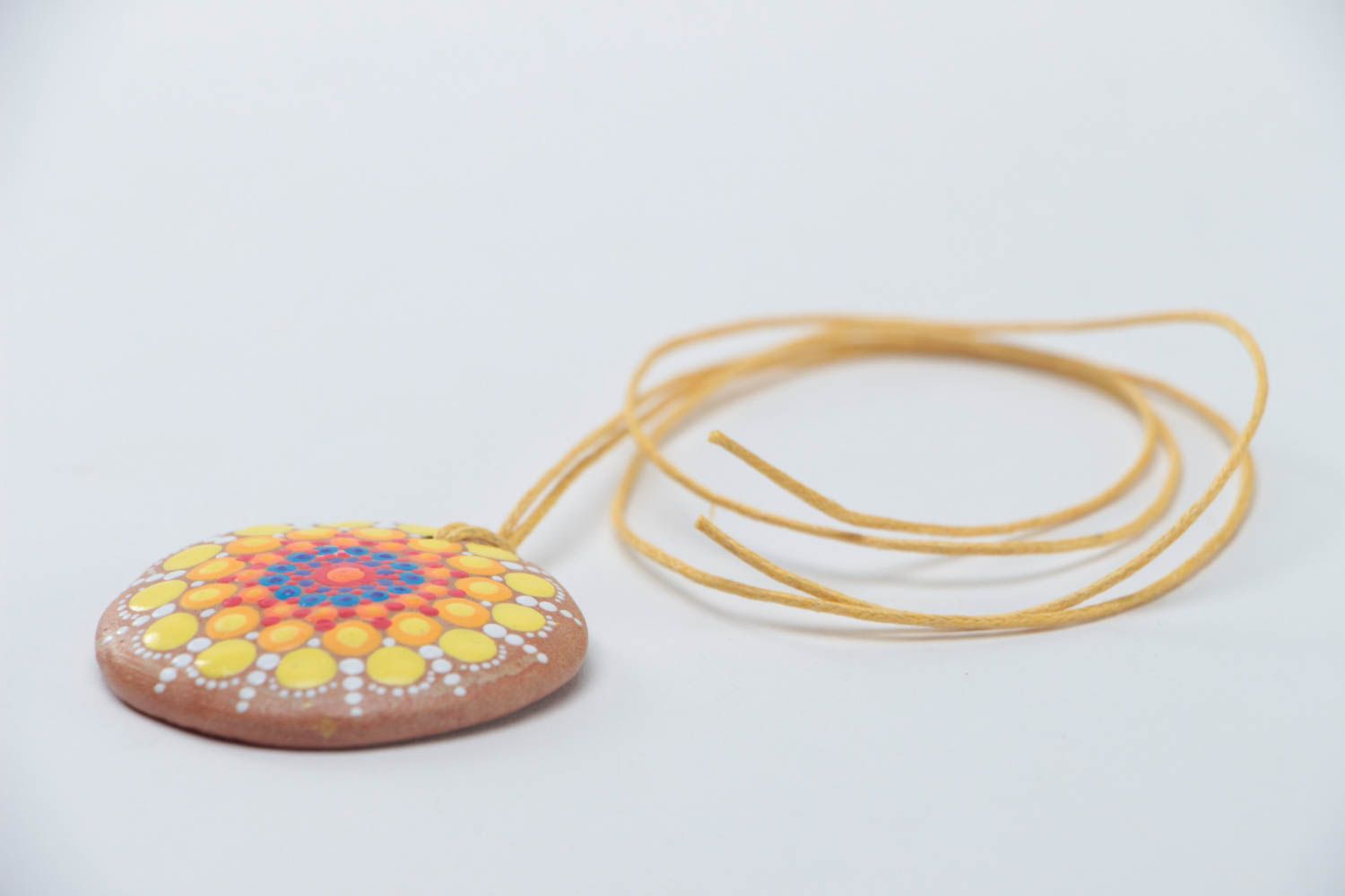 Unusual handmade designer ceramic round pendant with bright dot painting on cord photo 3