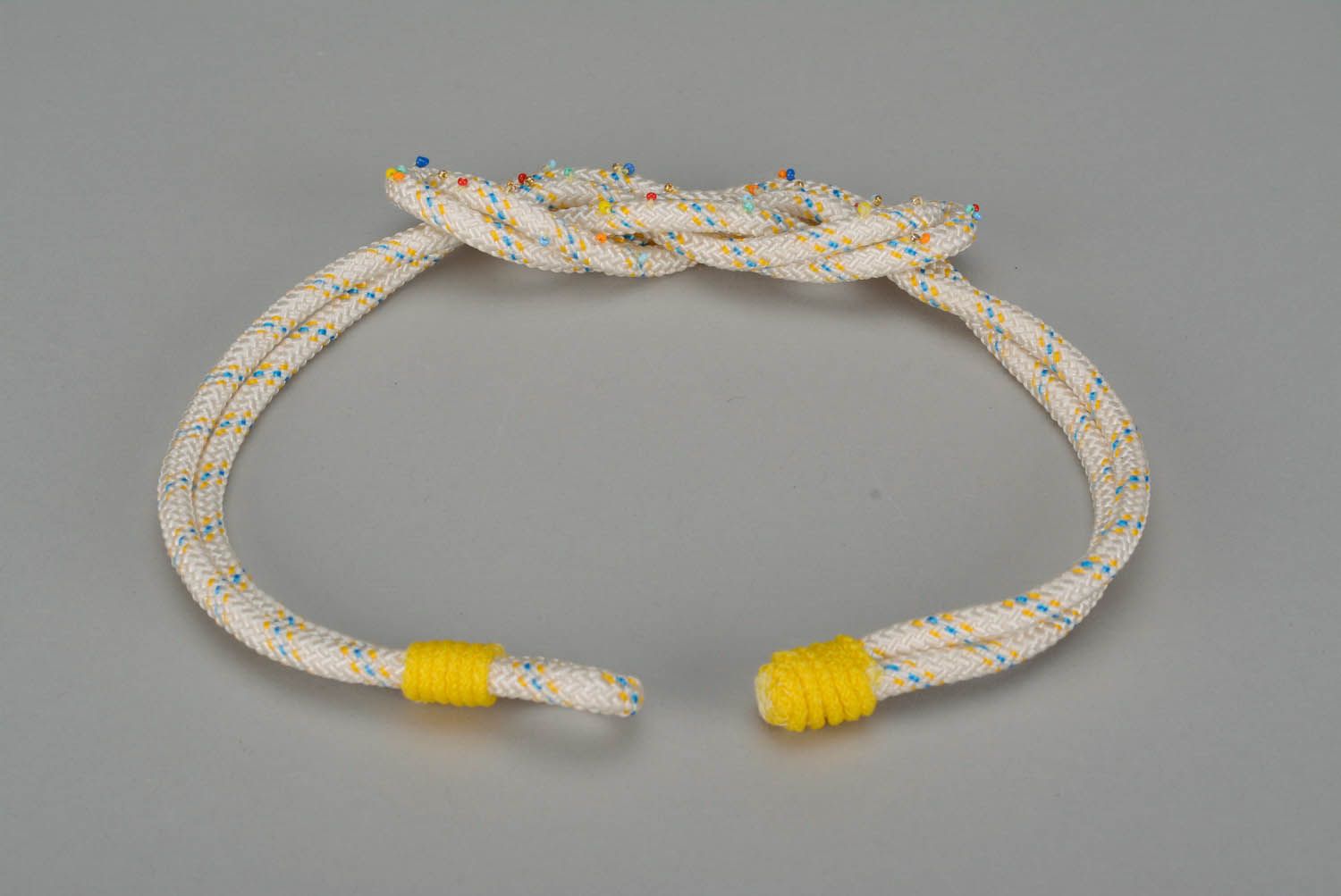 Necklace Made of String Embroidered with Beads photo 2
