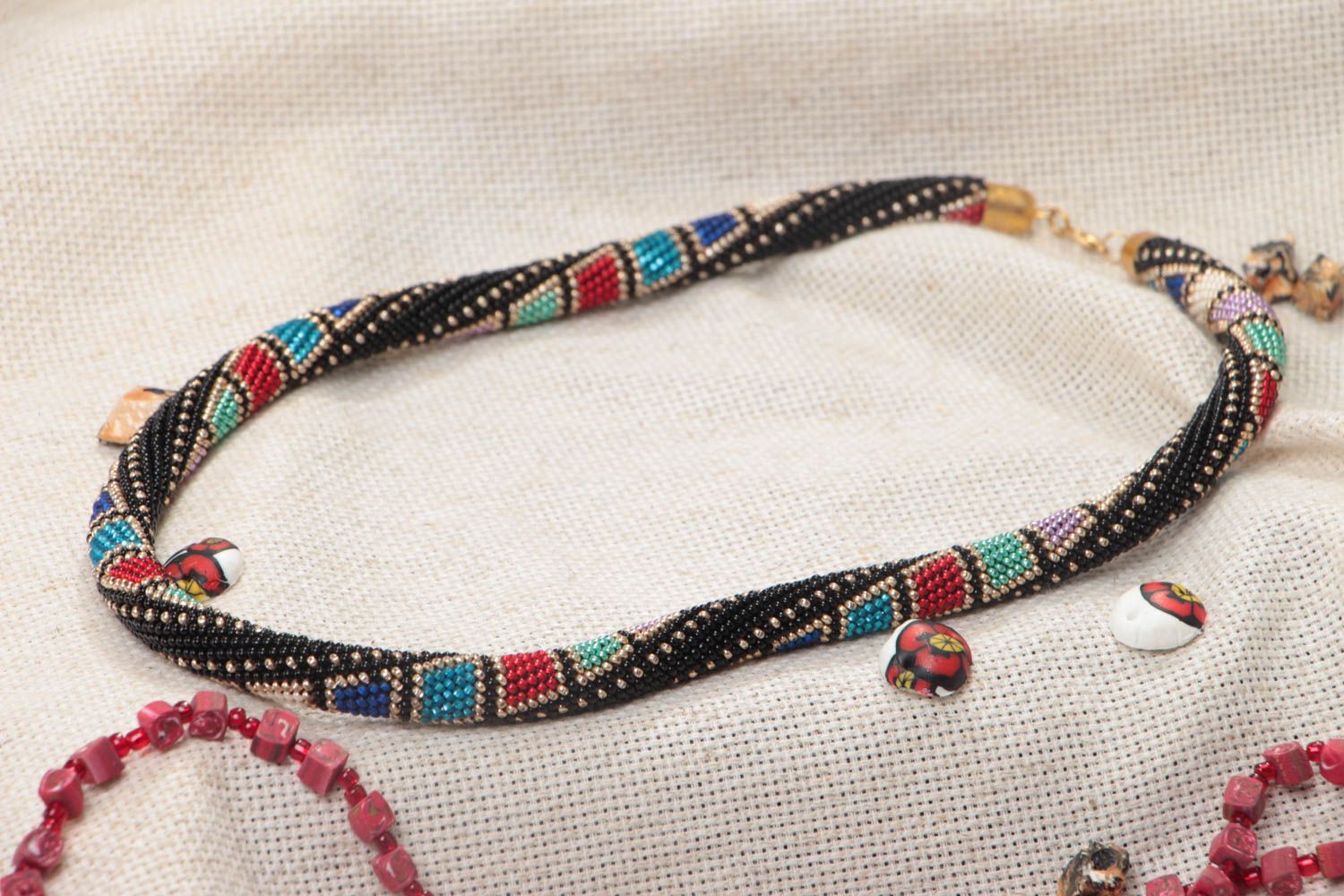 Handmade long designer dark beaded cord necklace with interesting ornament photo 1