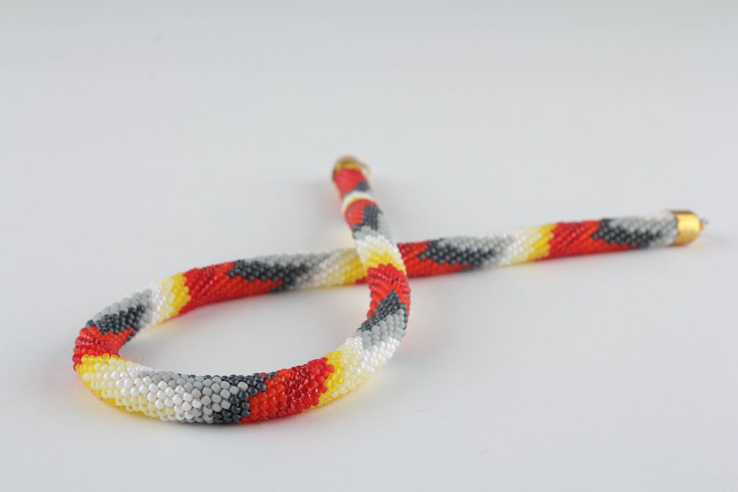 Multicolored cord necklace photo 1