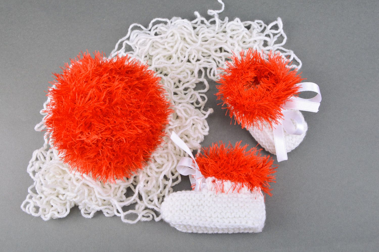 Handmade crochet soft toy ball and knitted baby booties in red and white colors photo 5