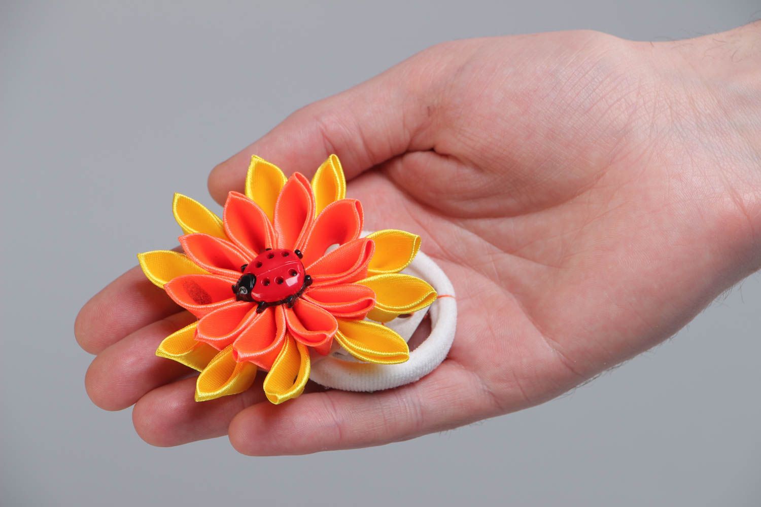 Handmade scrunchy with bright yellow and orange large flower made using kanzashi technique photo 5