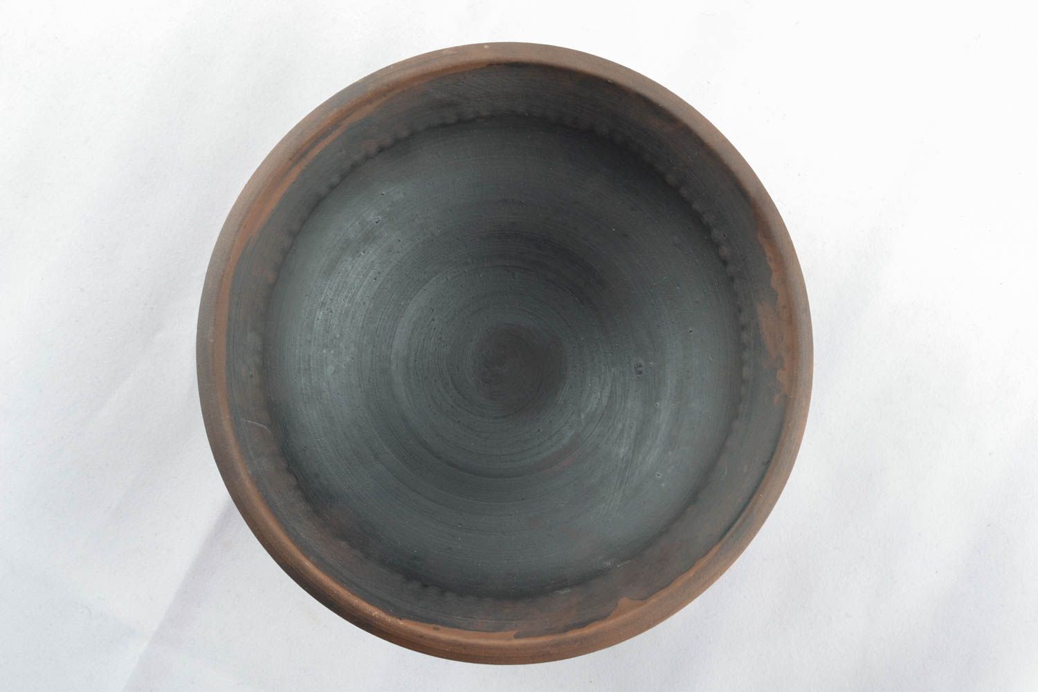 Escudilla de cerámica hecha a mano foto 2