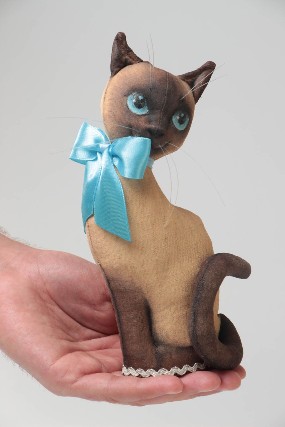 Handmade designer soft toy sewn of primed fabric beautiful cat with blue bow photo 5