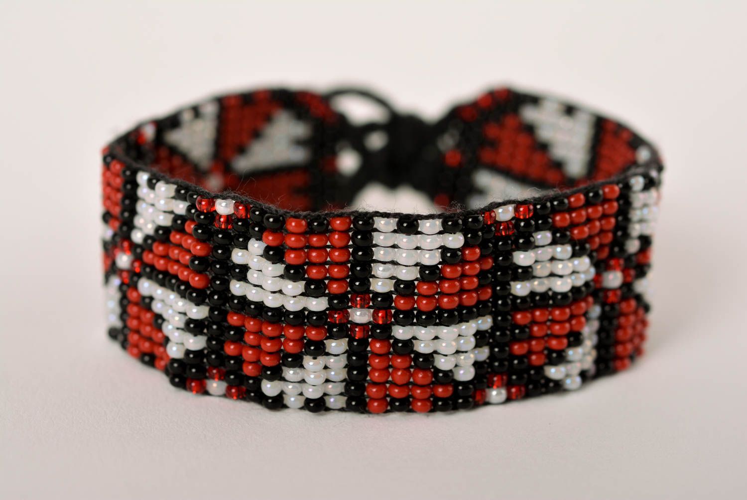 Black cord strand bracelet with geometric ornament for girls photo 1