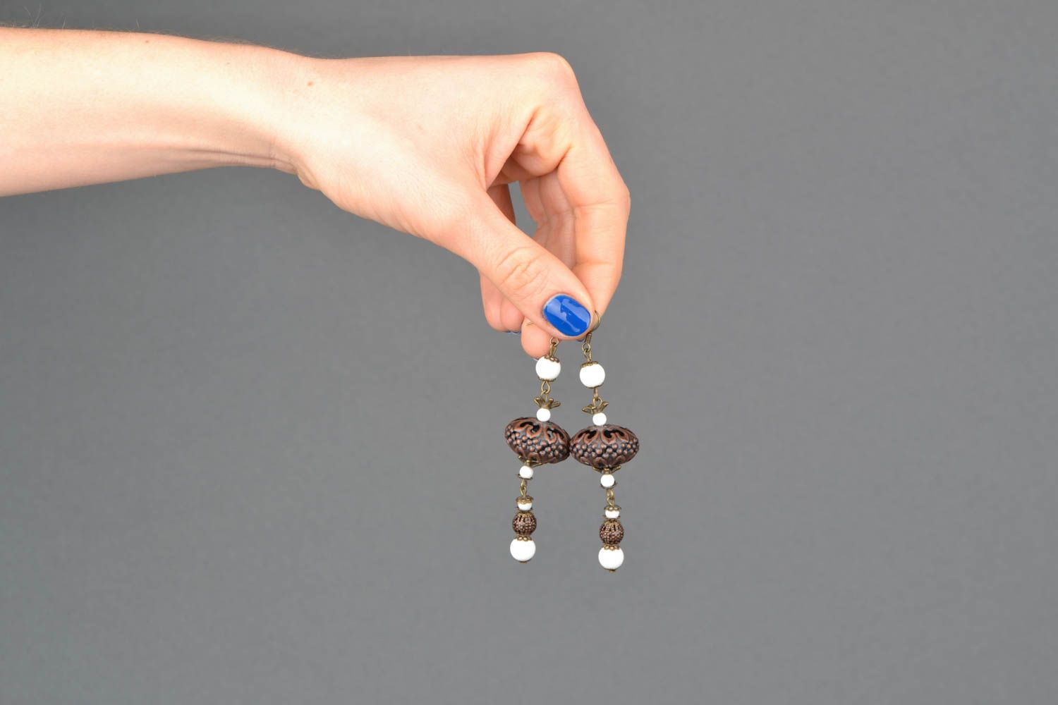 Metal earrings with ceramic beads photo 2