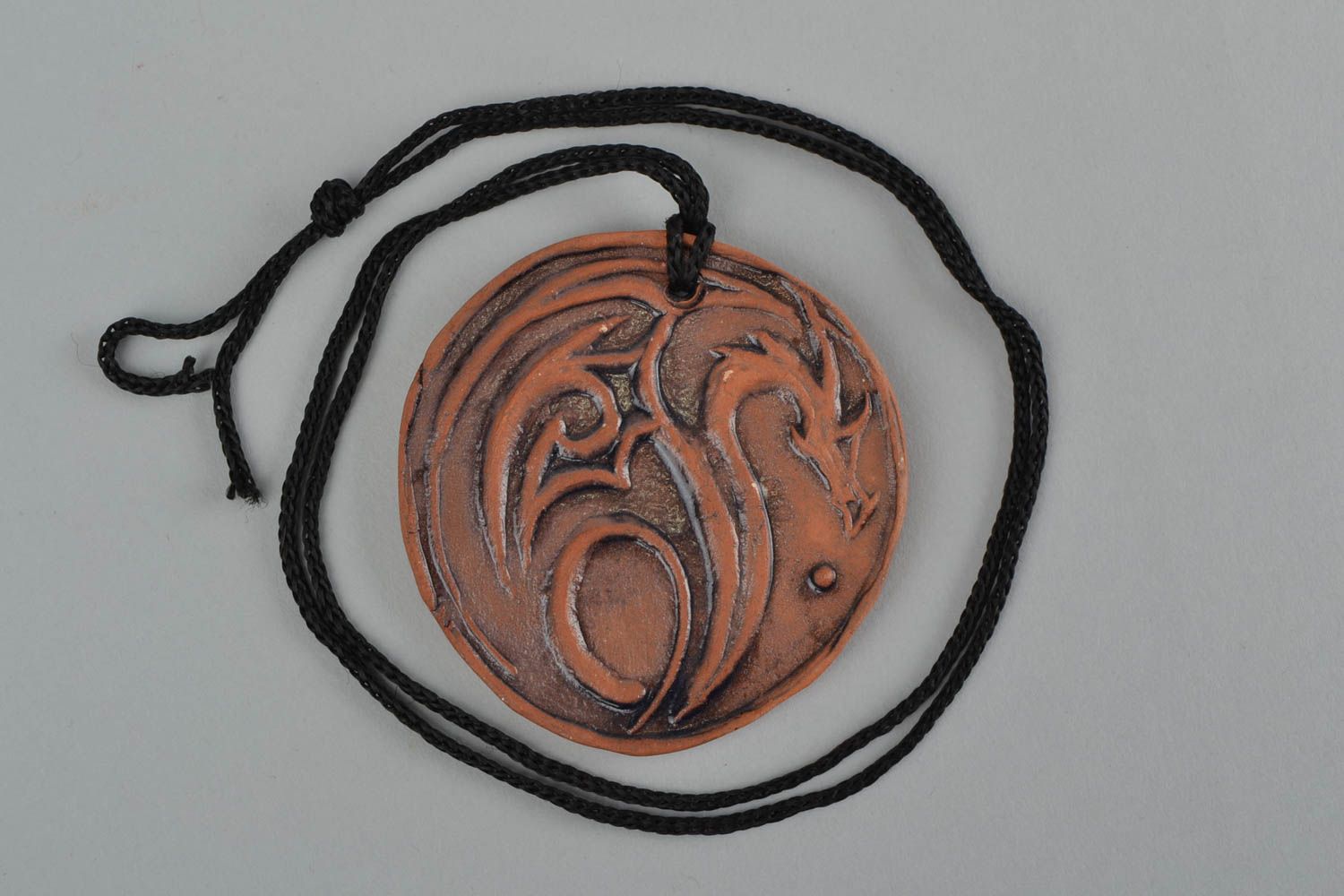 Handmade large brown ceramic round pendant with dragon image photo 3