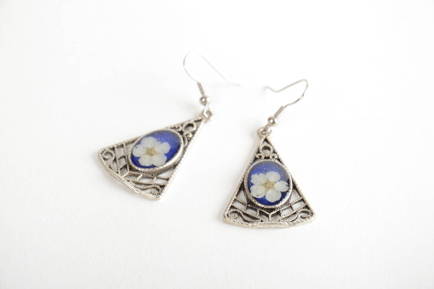 Handmade metal triangle dangling earrings with real flowers in epoxy resin photo 5