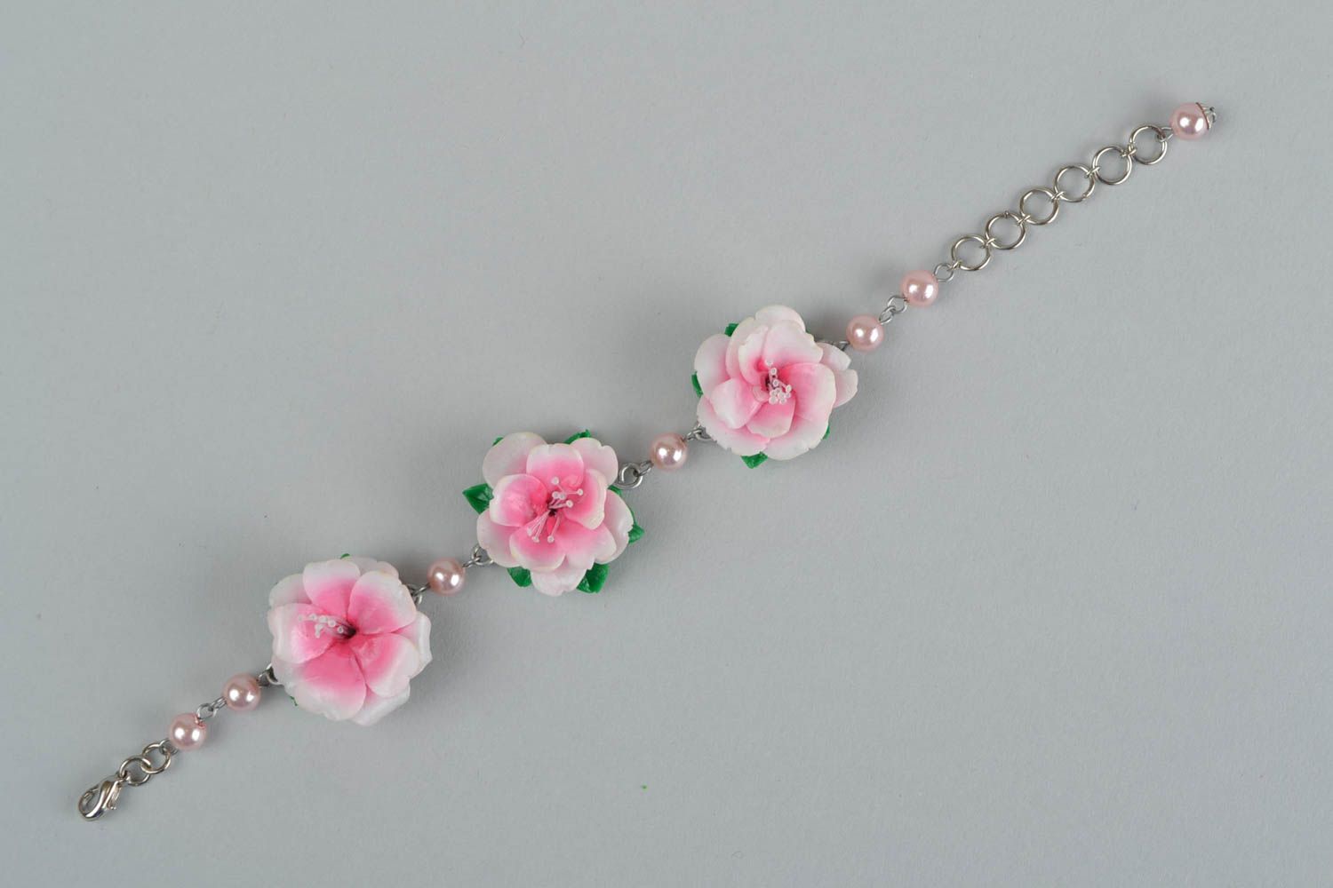 Bright handmade designer wrist bracelet with molded plastic flowers Tea Rose photo 4