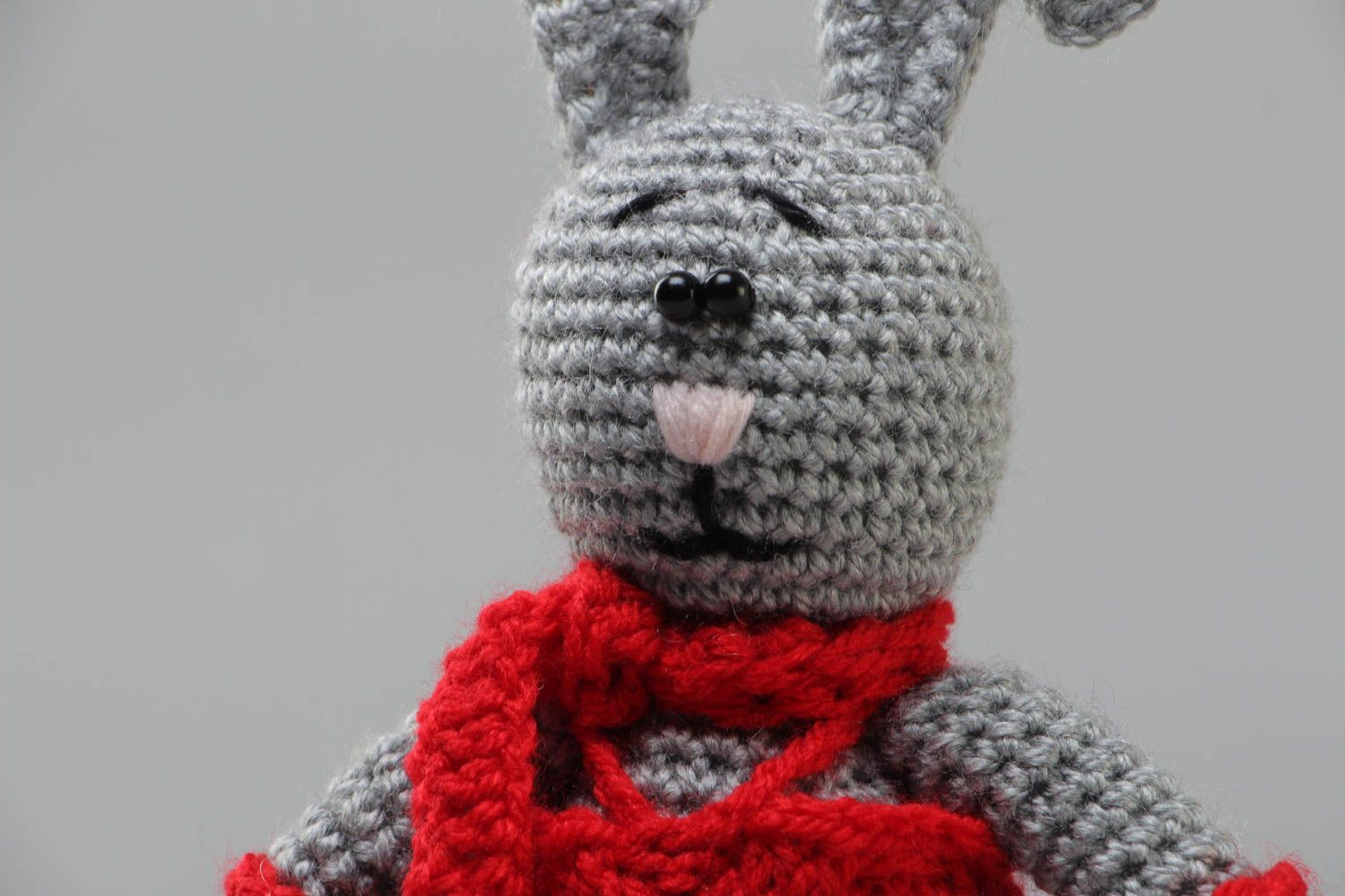 Handmade soft toy gray rabbit crocheted of acrylic threads with red scarf  photo 3