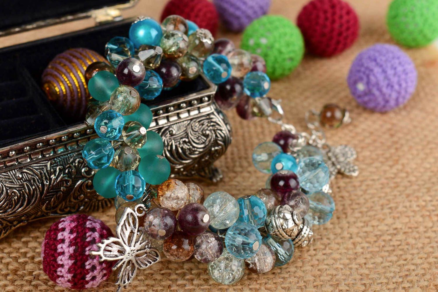 Handmade festive beautiful bracelet made of crystal and glass with charms photo 1