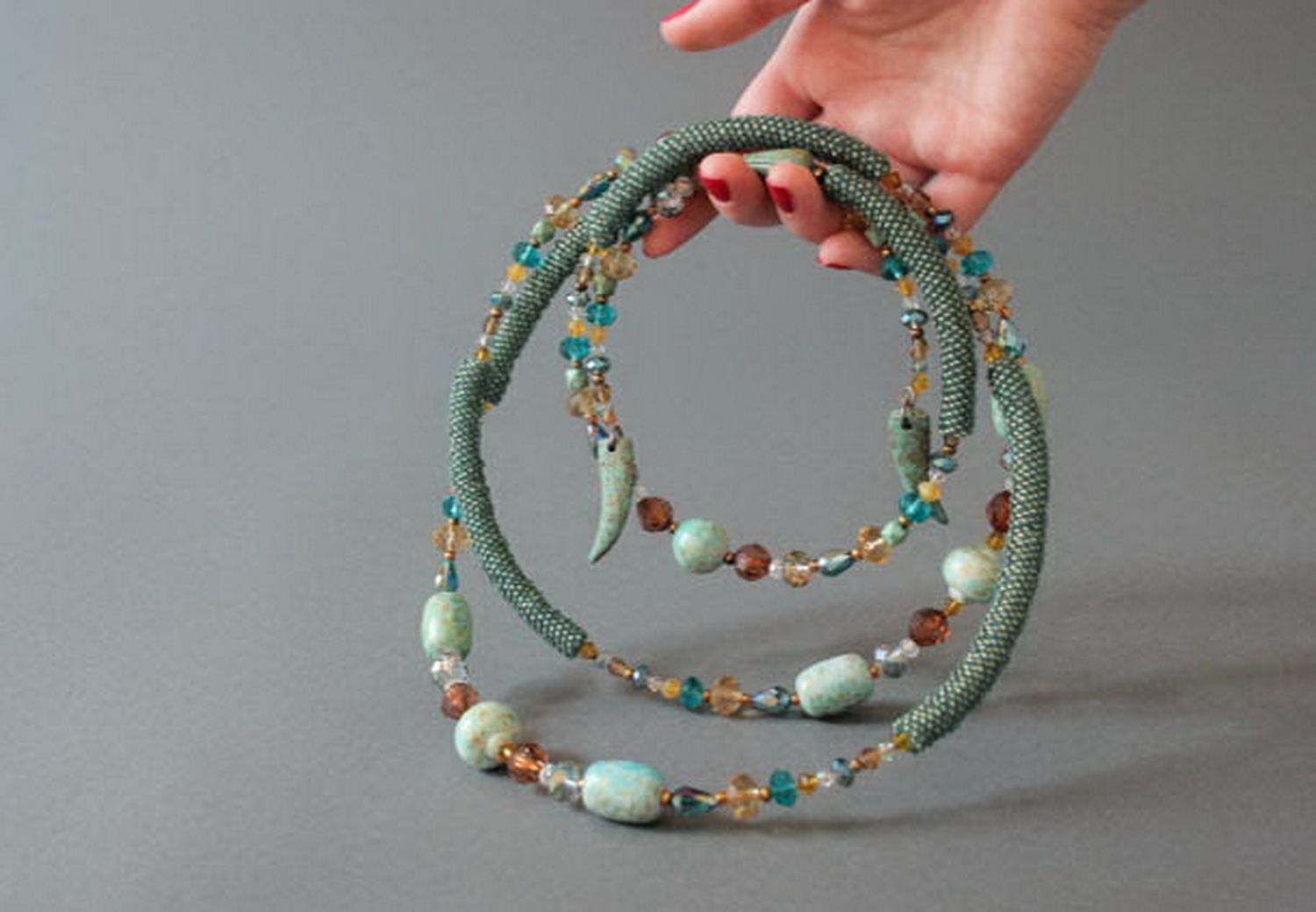 Plaited necklace made from beads with decorative stones photo 9