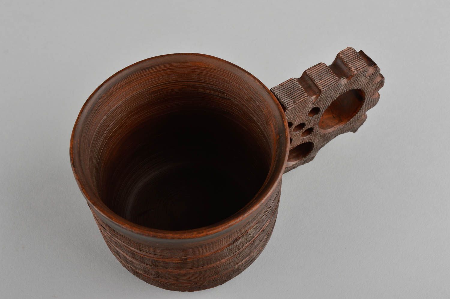 Clay cup for drinks with large handle in dark brown color photo 3