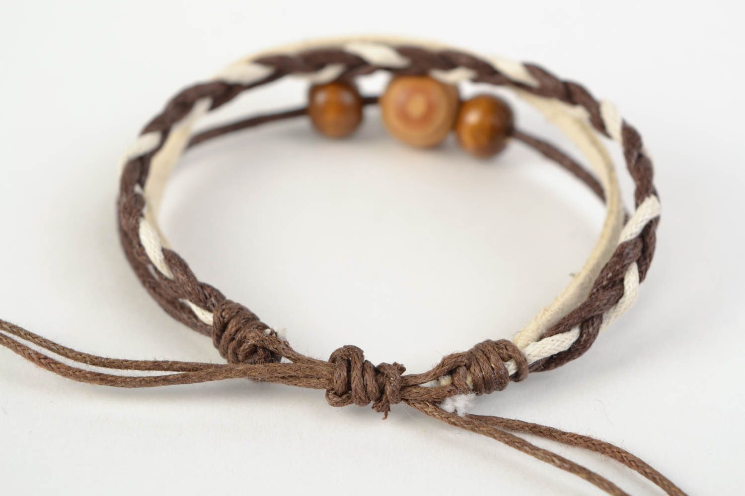 Handmade thin brown suede cord woven wrist bracelet with wooden beads insert photo 4