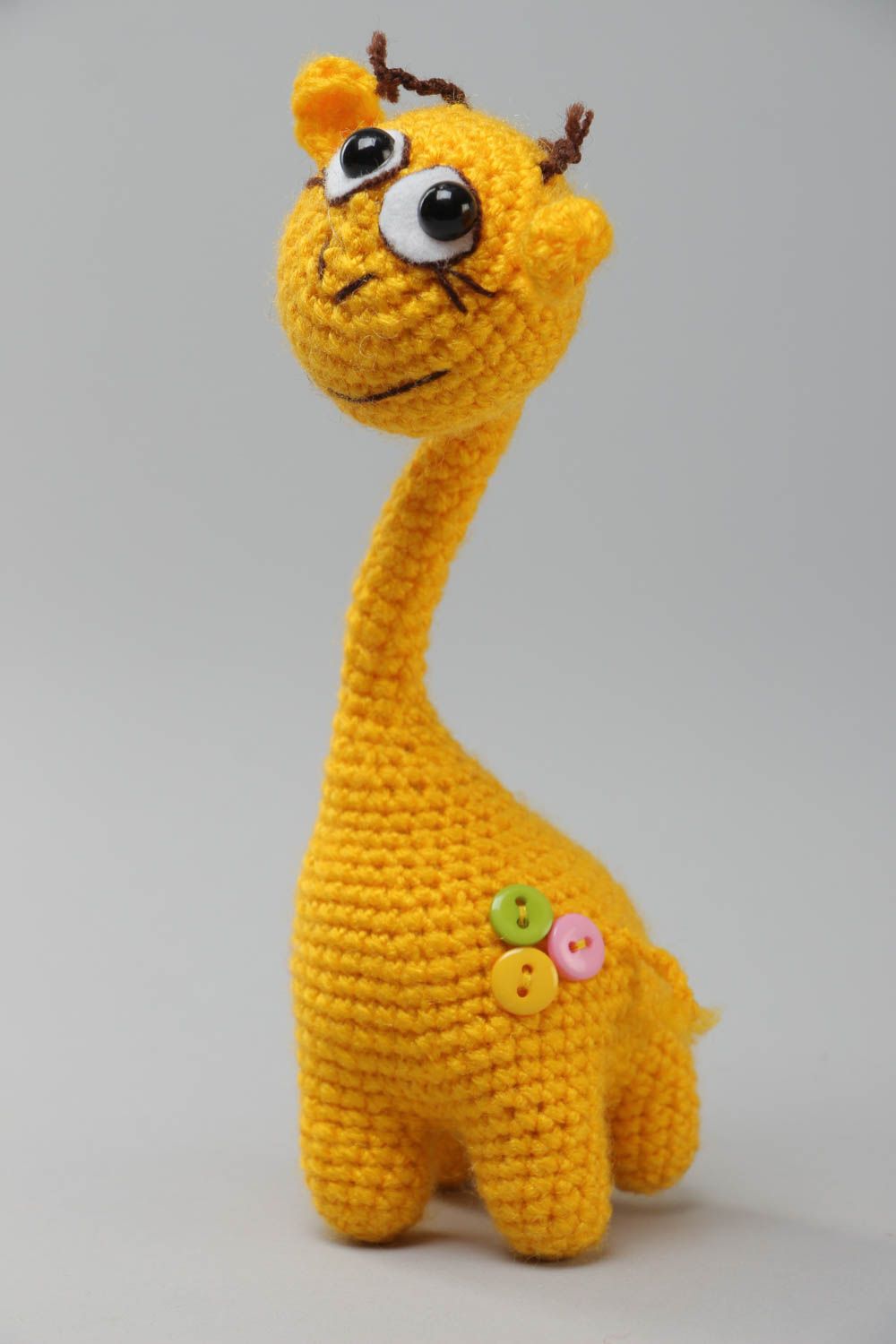 Jouet tricoté au crochet en fils acryliques fait main girafe jaune sur carcasse photo 2