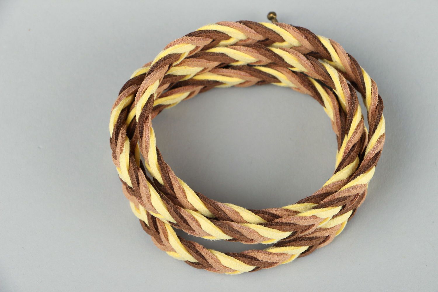 Bracelet braided of suede photo 1