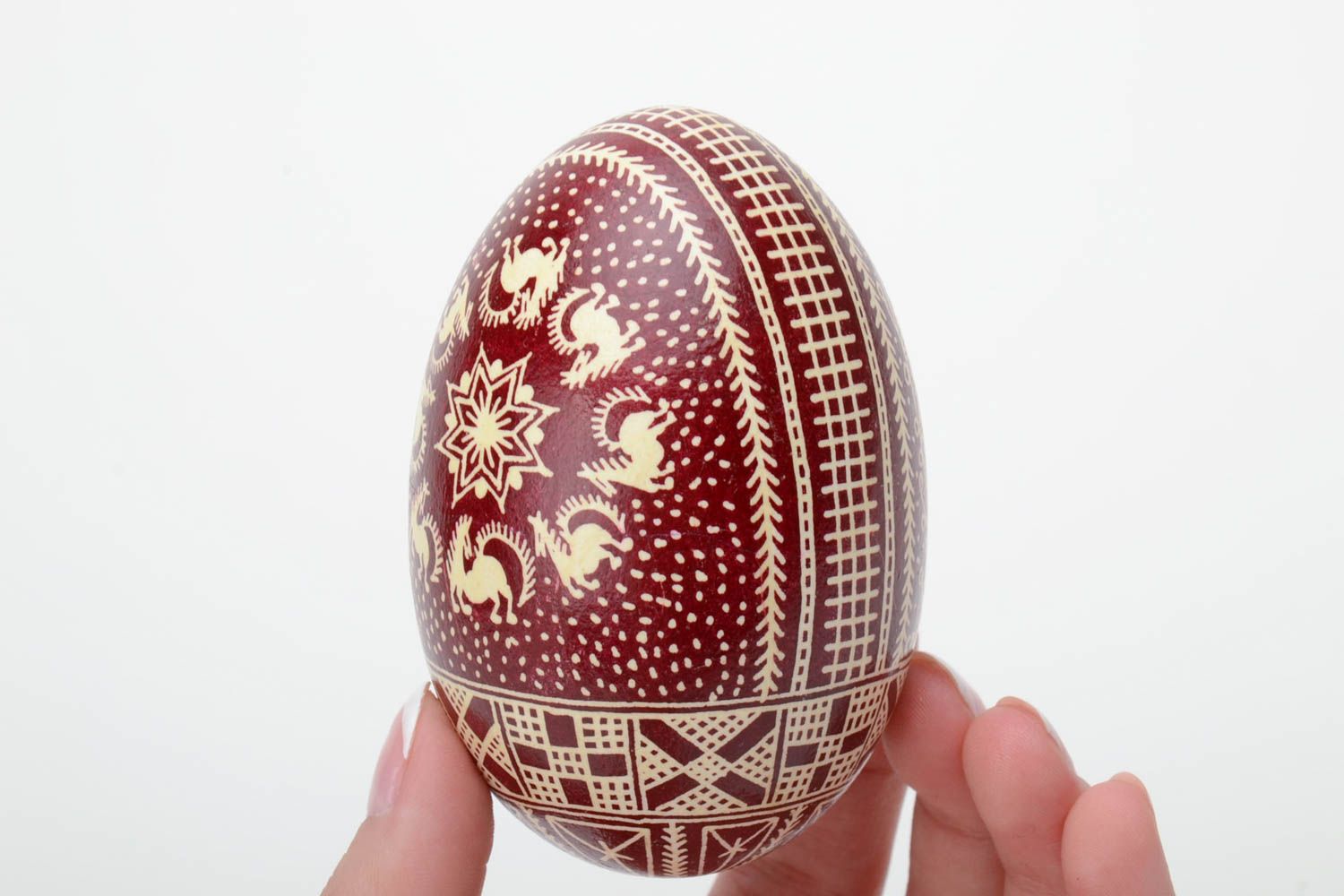 Red and white handmade painted goose egg decorated using waxing technique photo 5
