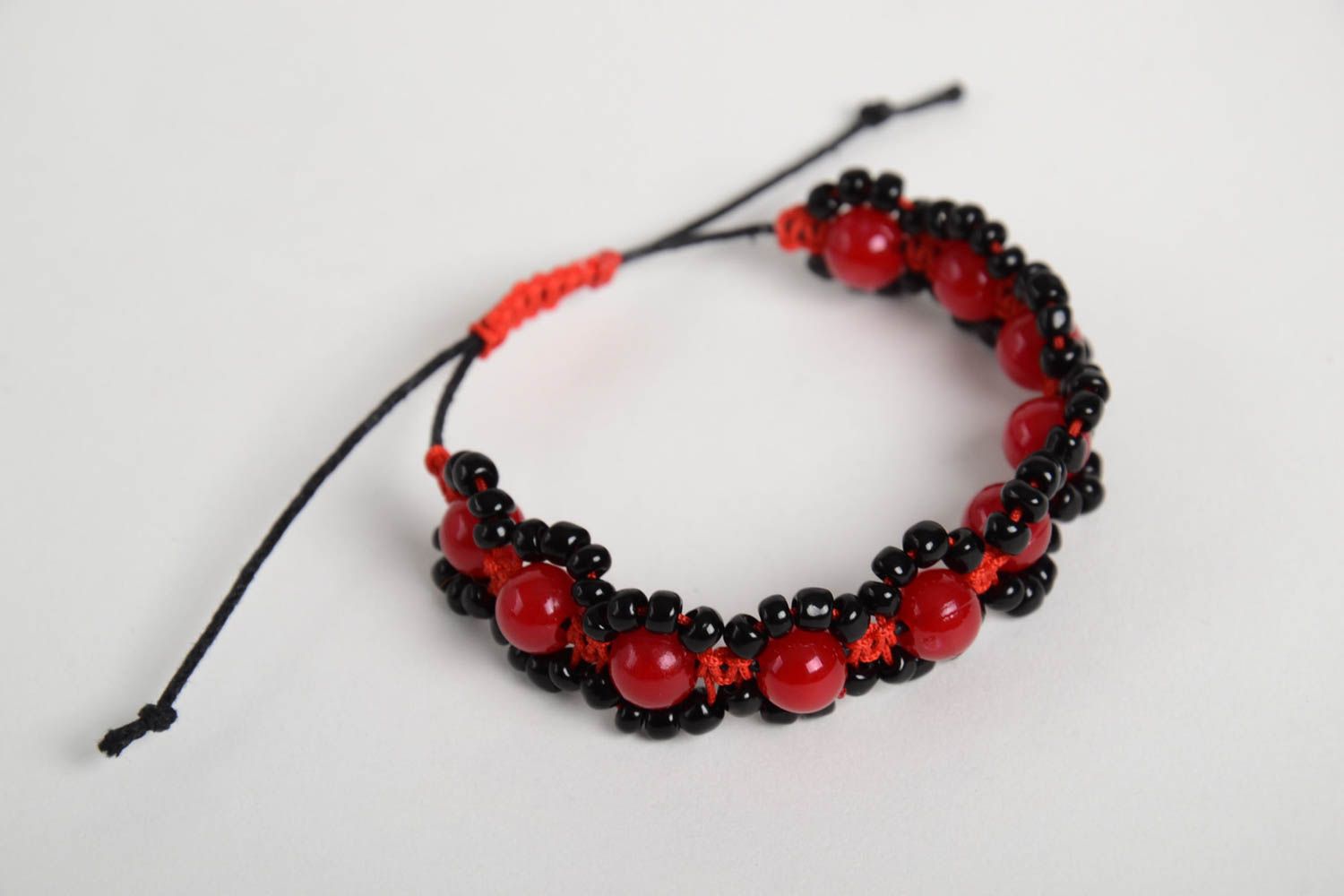 Strand Shambala bracelet on red cord with red and black beads for girls photo 1