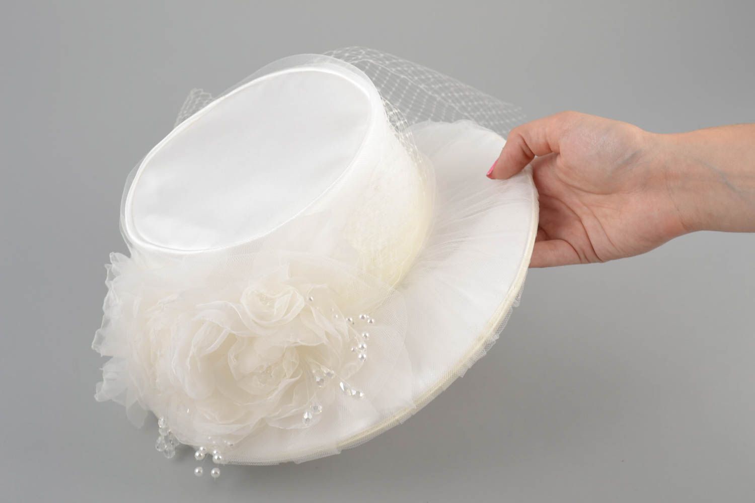 Unusual small handmade stylish designer bridal hat with veil of milky color photo 5