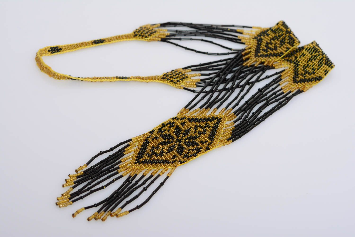 Длинное бисерное колье в этническом стиле гердан ручной работы желто-черный фото 1