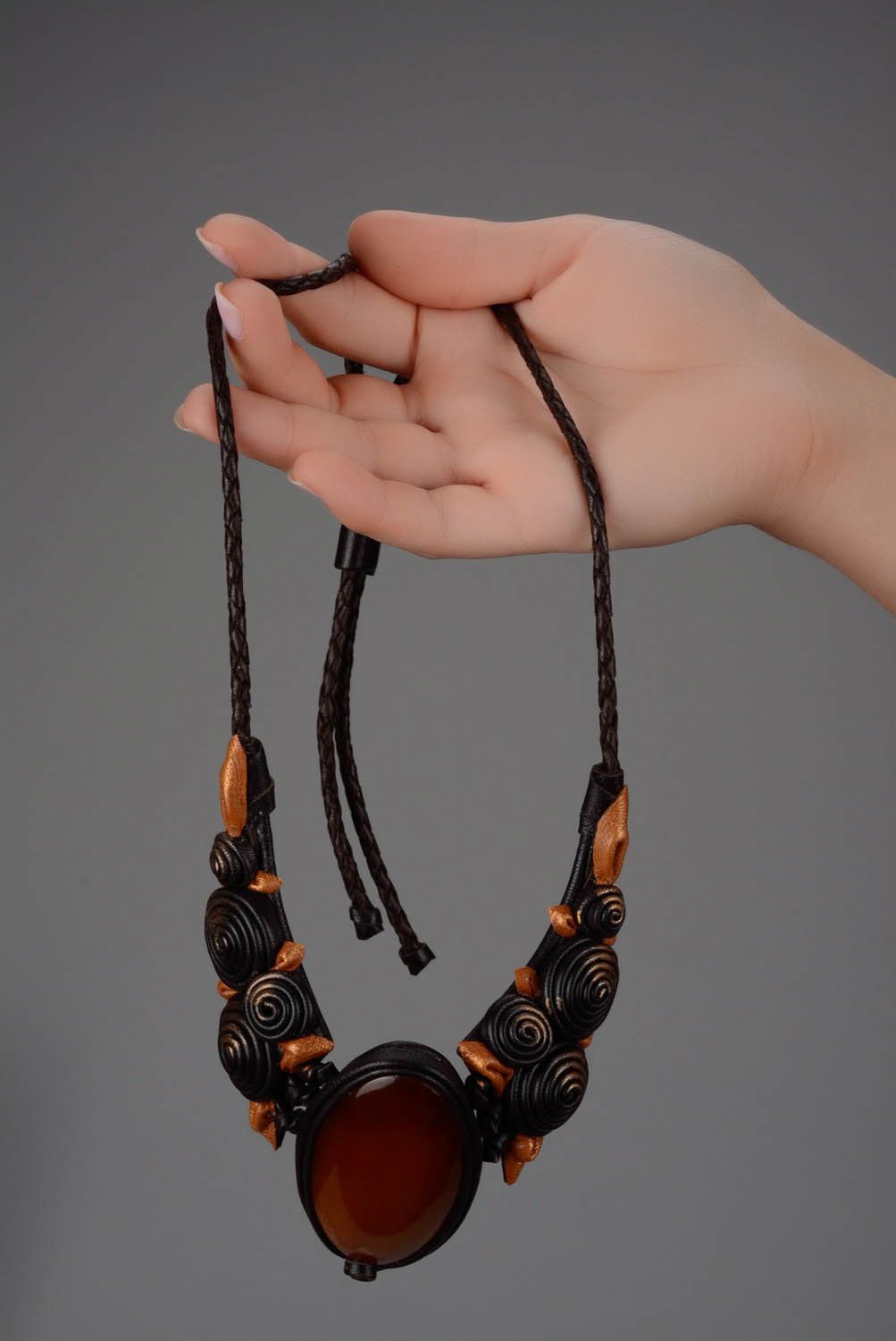 Necklace made ​​of leather and cow horn photo 5