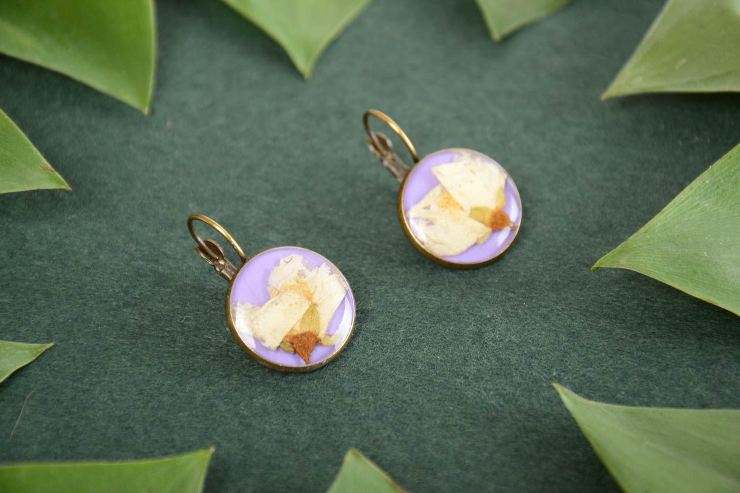 Women's handmade designer round earrings with dried flowers and epoxy resin photo 1