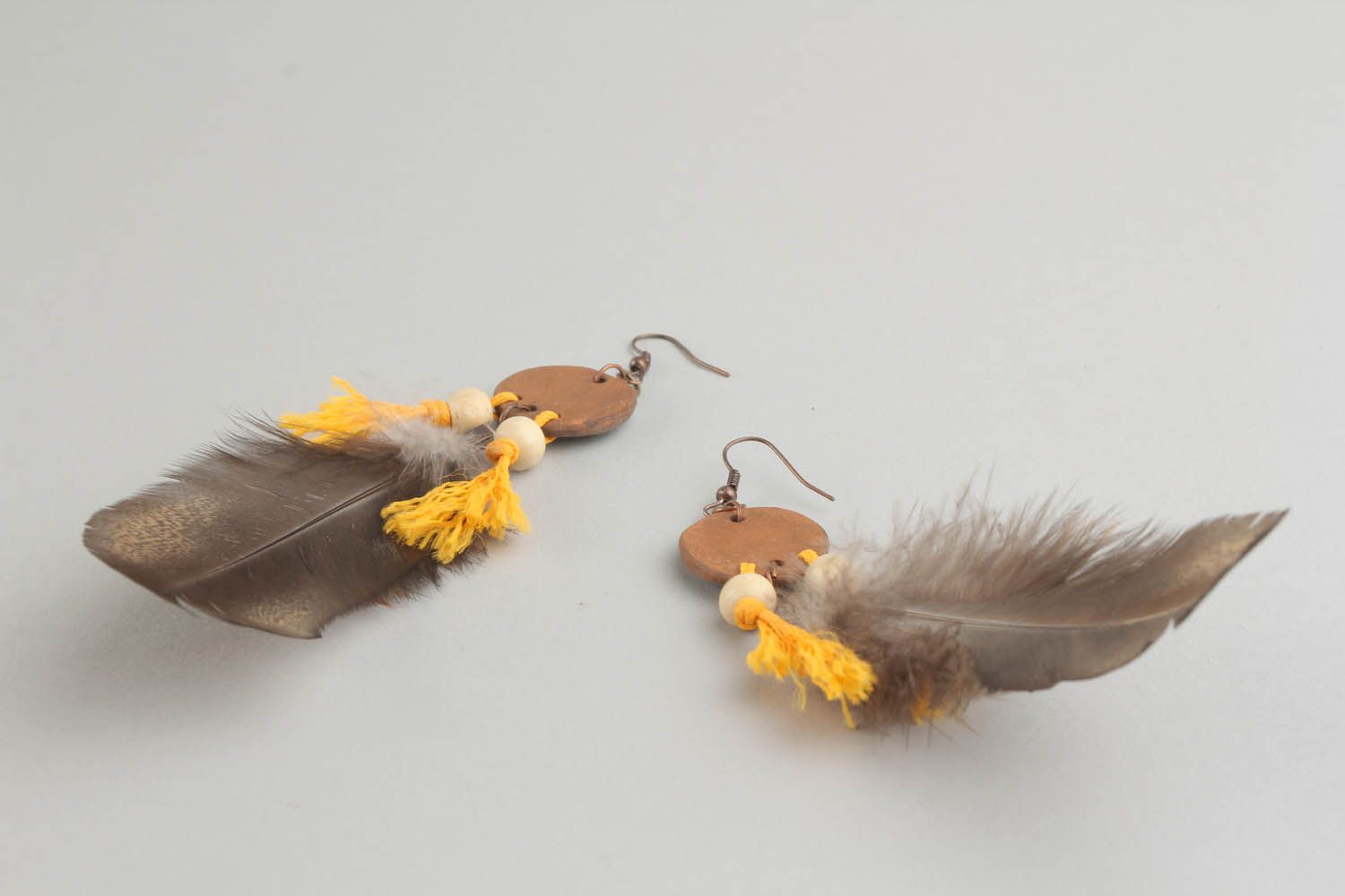 Earrings with feathers photo 4