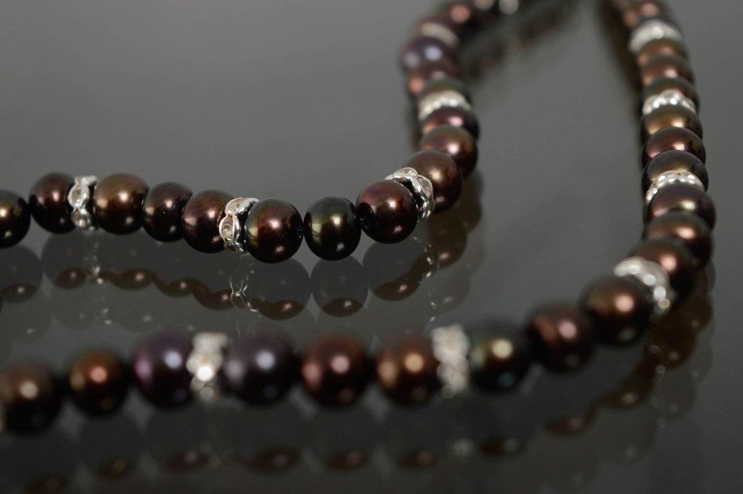 Designer bracelet with dark pearls photo 5