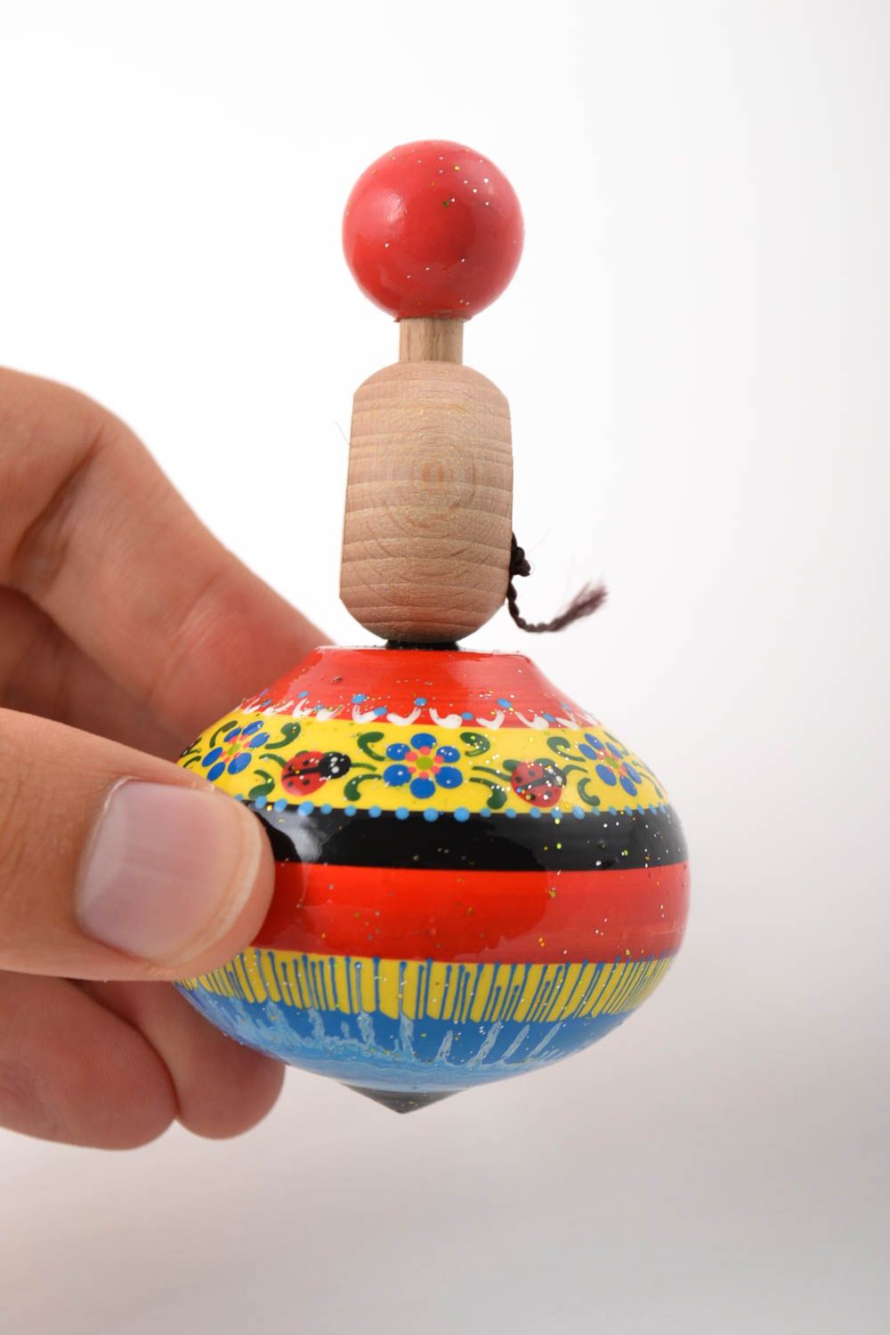 Trompo de madera hecho a mano juguete para niños con ornamentos regalo original foto 5