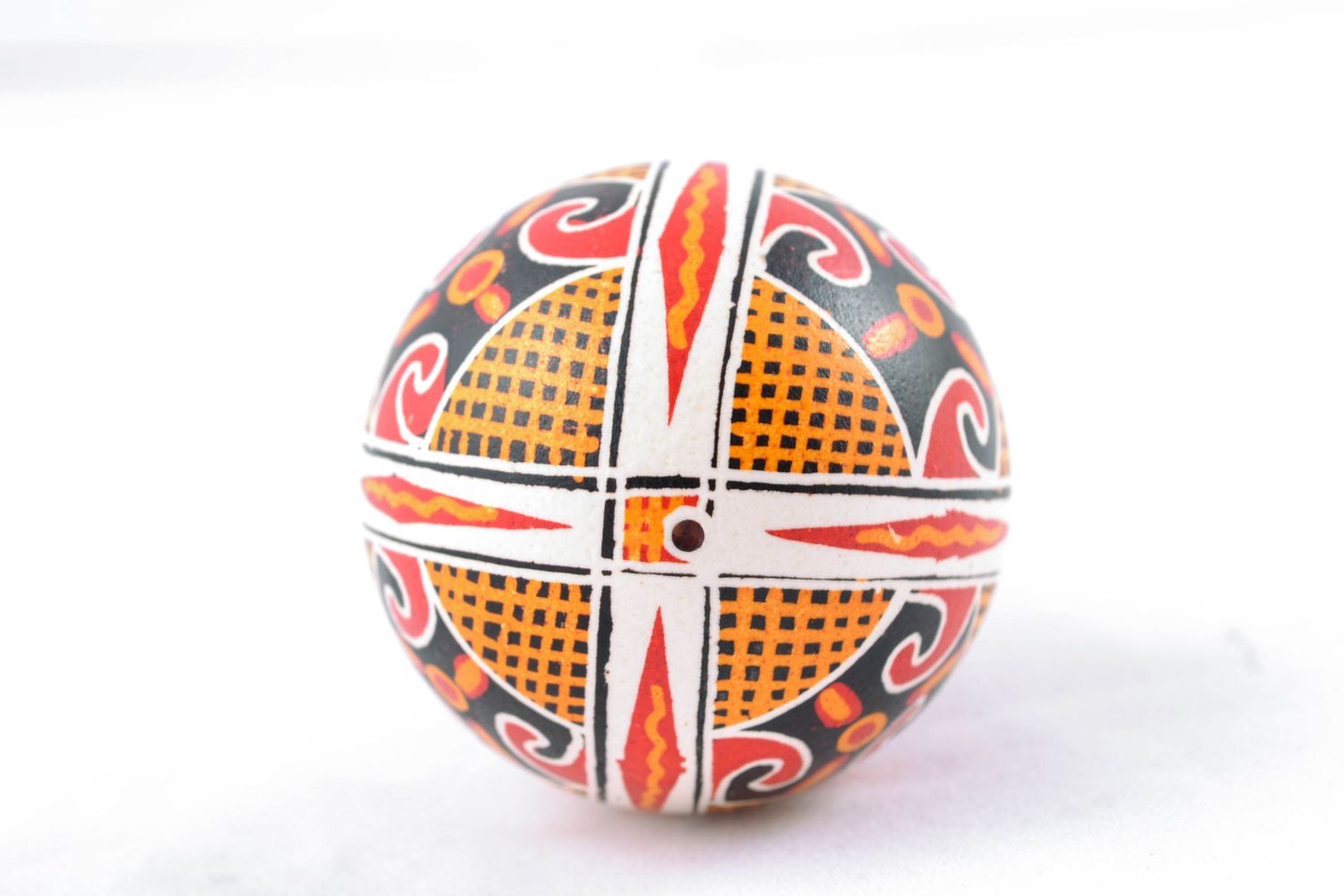 Handmade Easter egg painted with solar symbols photo 4