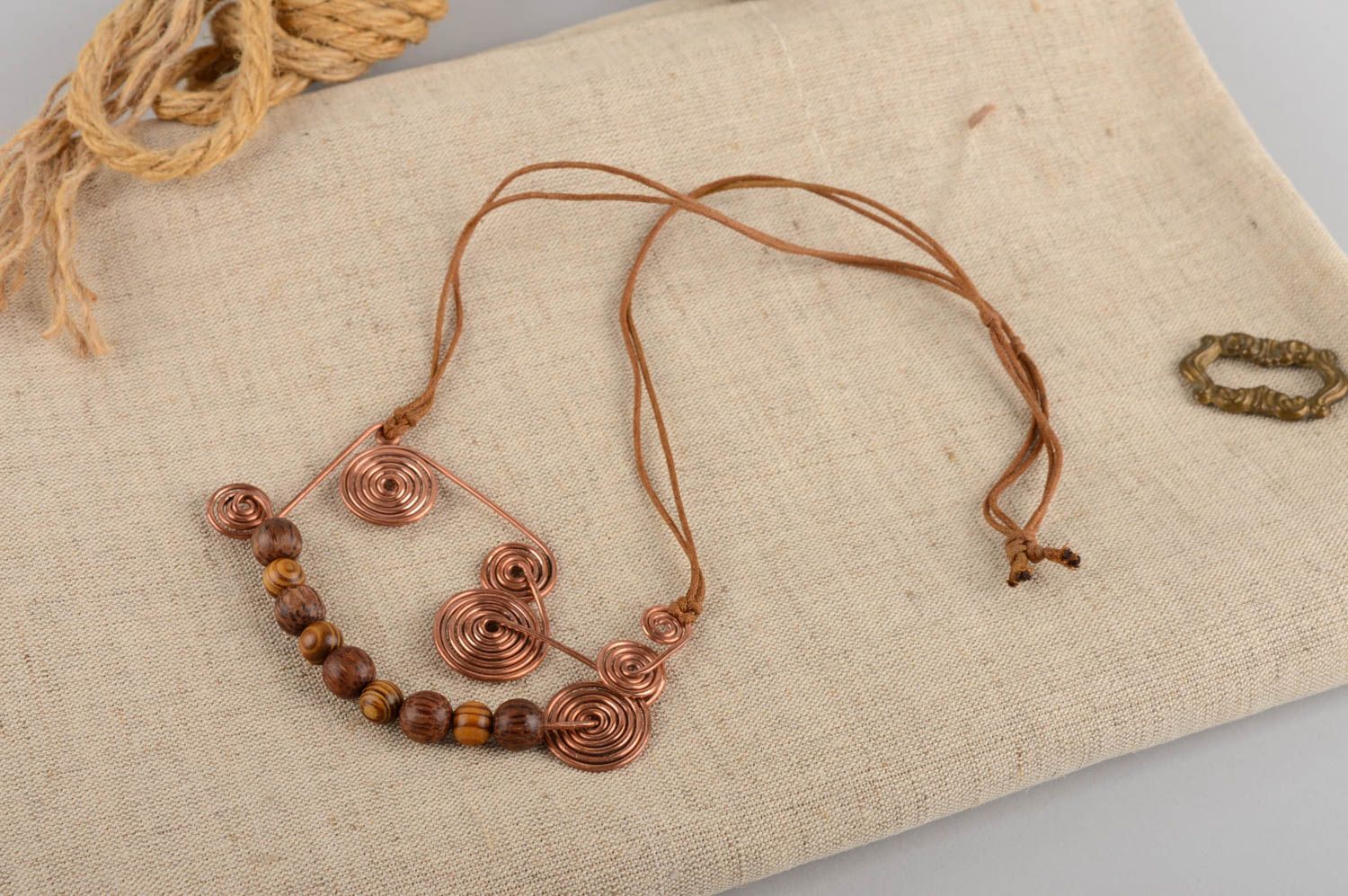 Beautiful women's handmade design pendant with wooden beads and copper elements photo 1
